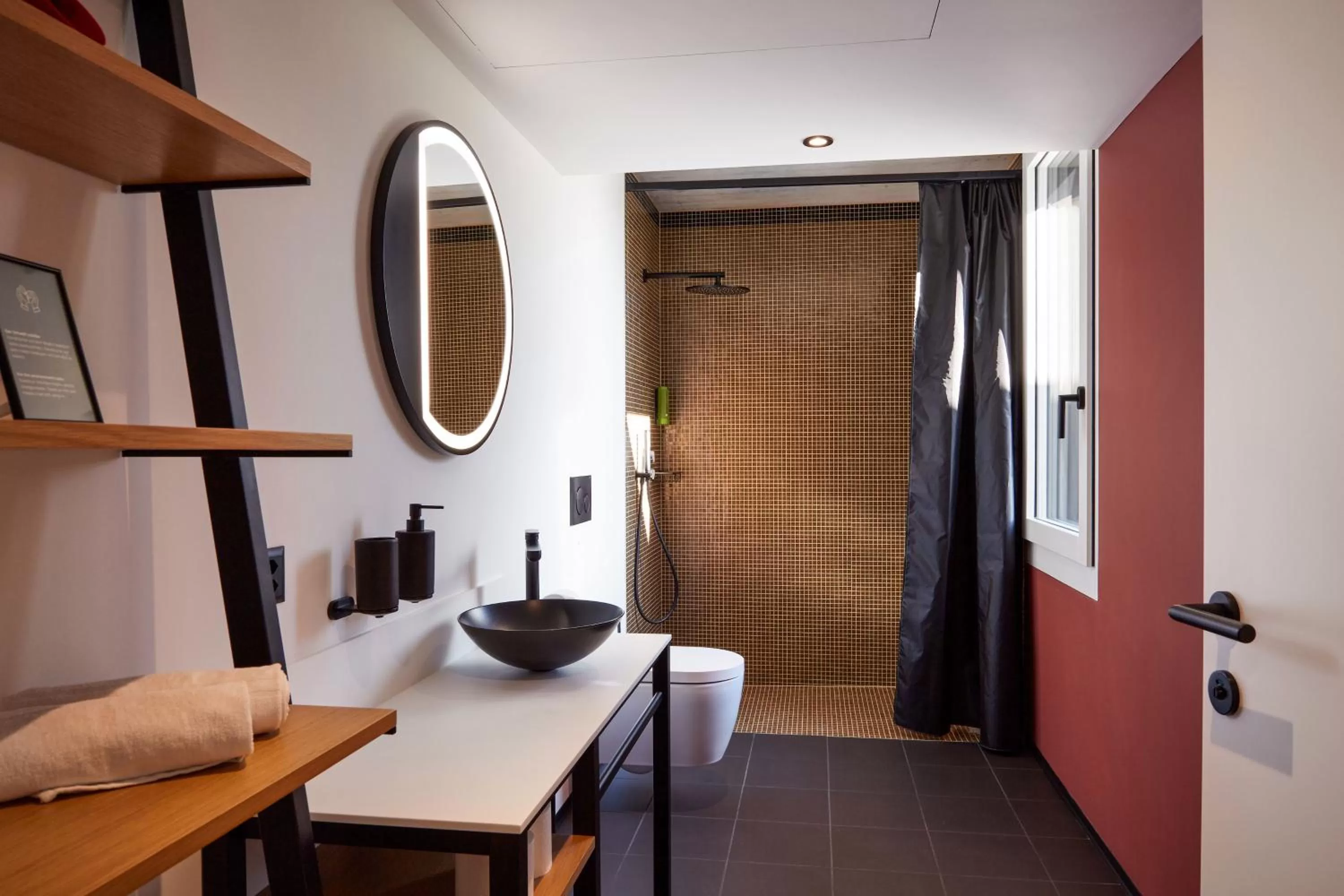 Bathroom, Bed in Tailormade Hotel RIGIBLICK Küssnacht