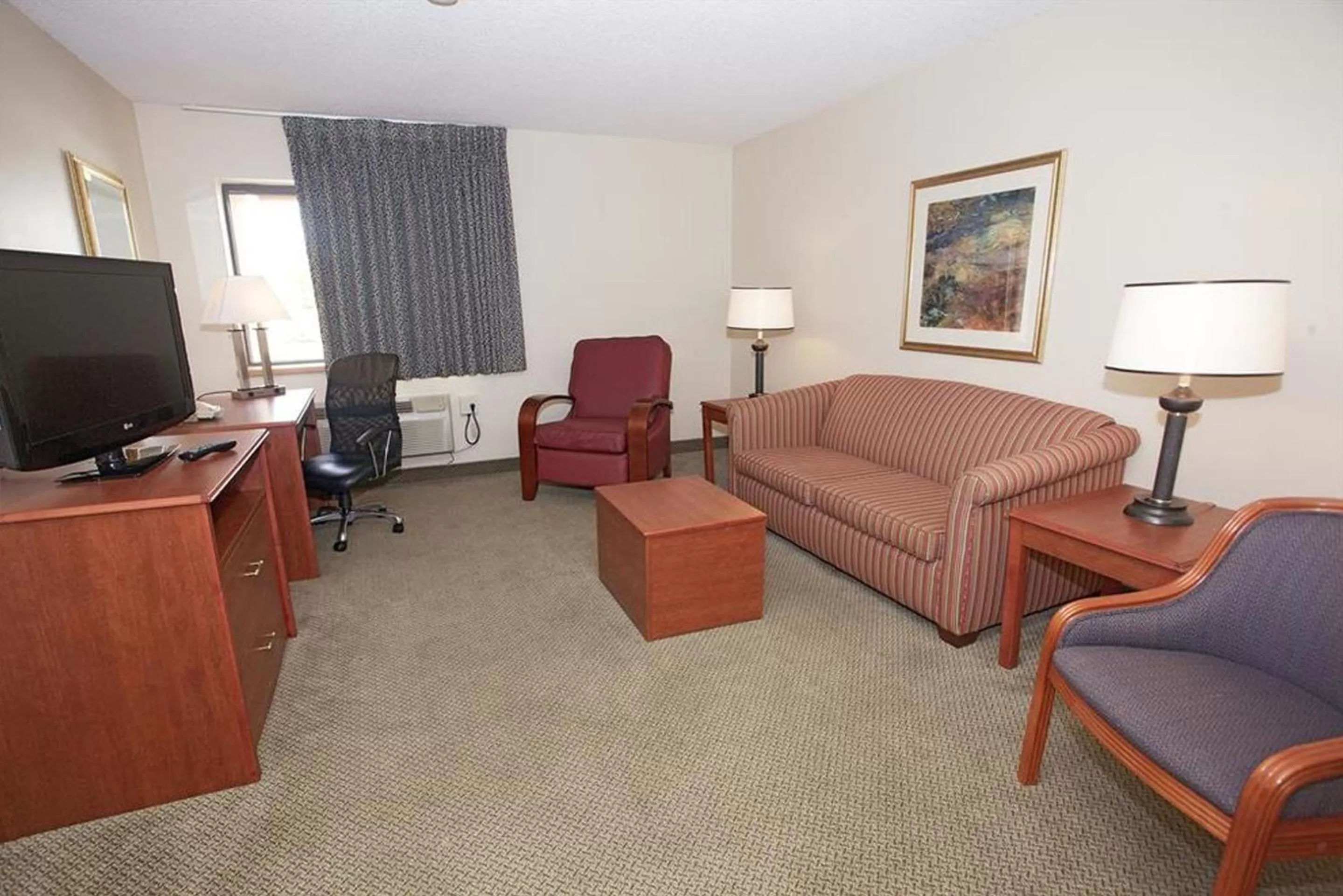 Seating area in La Quinta Inn by Wyndham Detroit Southgate