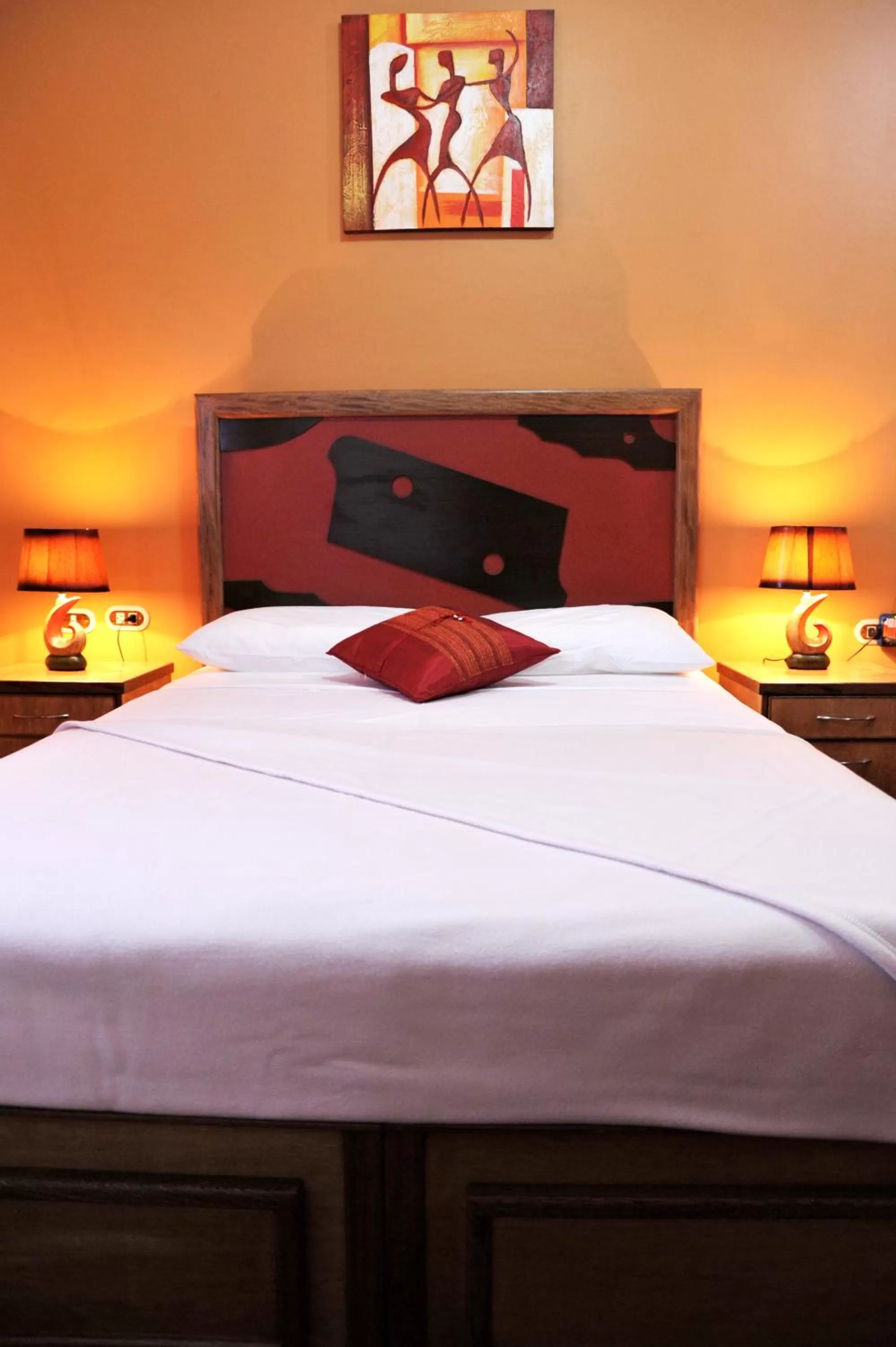 Bed in Culture Crossroads Inn