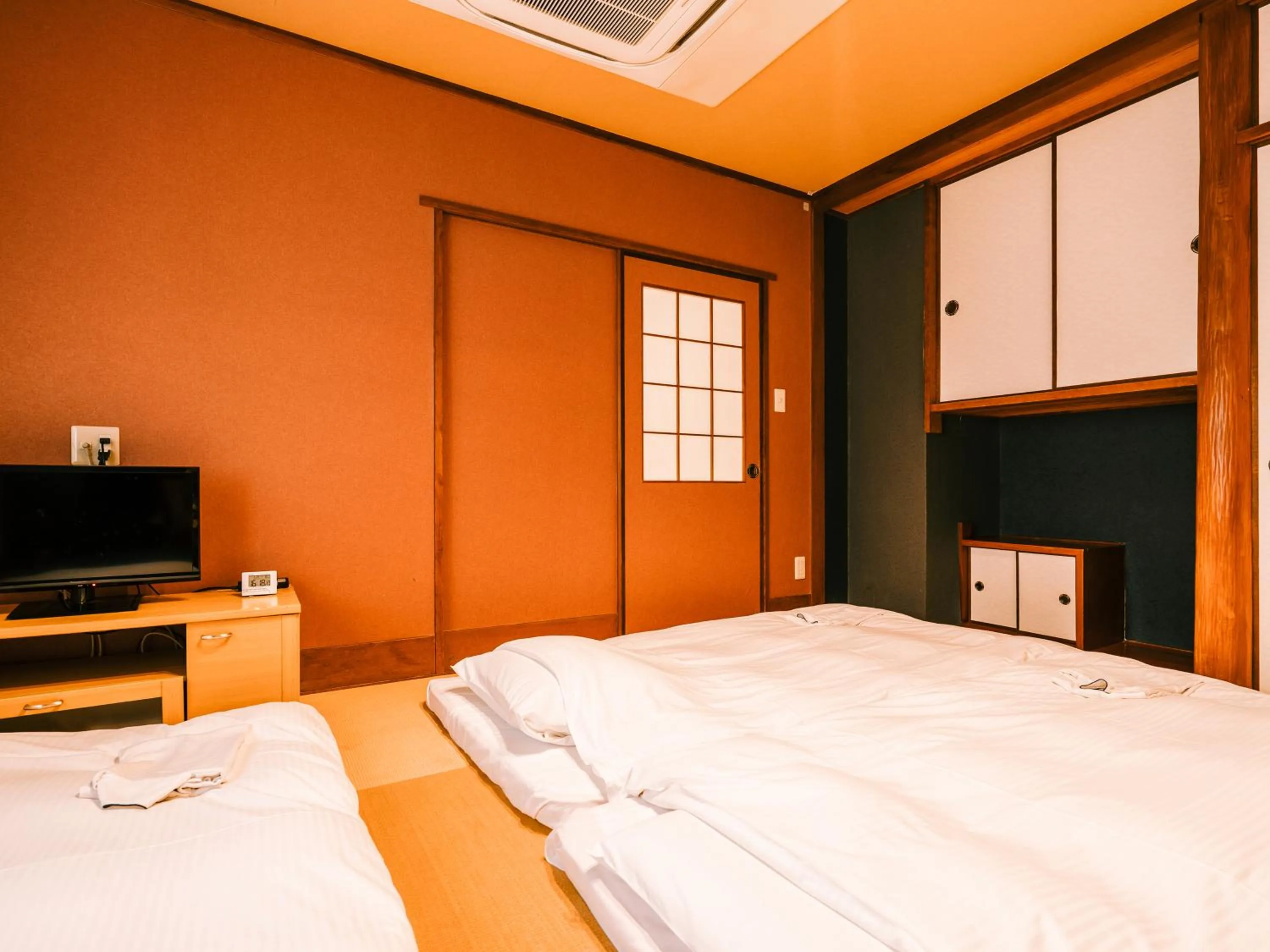 Photo of the whole room, Bed in Hotel AreaOne Takamatsu