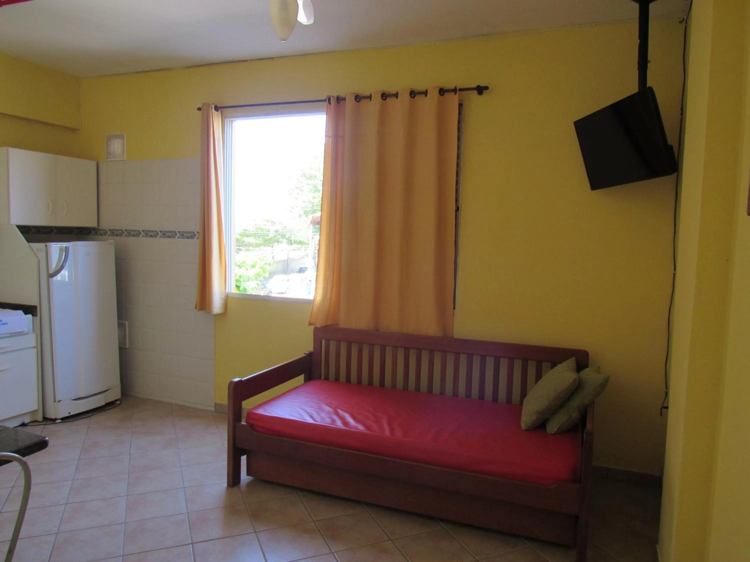 Communal lounge/ TV room in Pousada Recanto da Barra