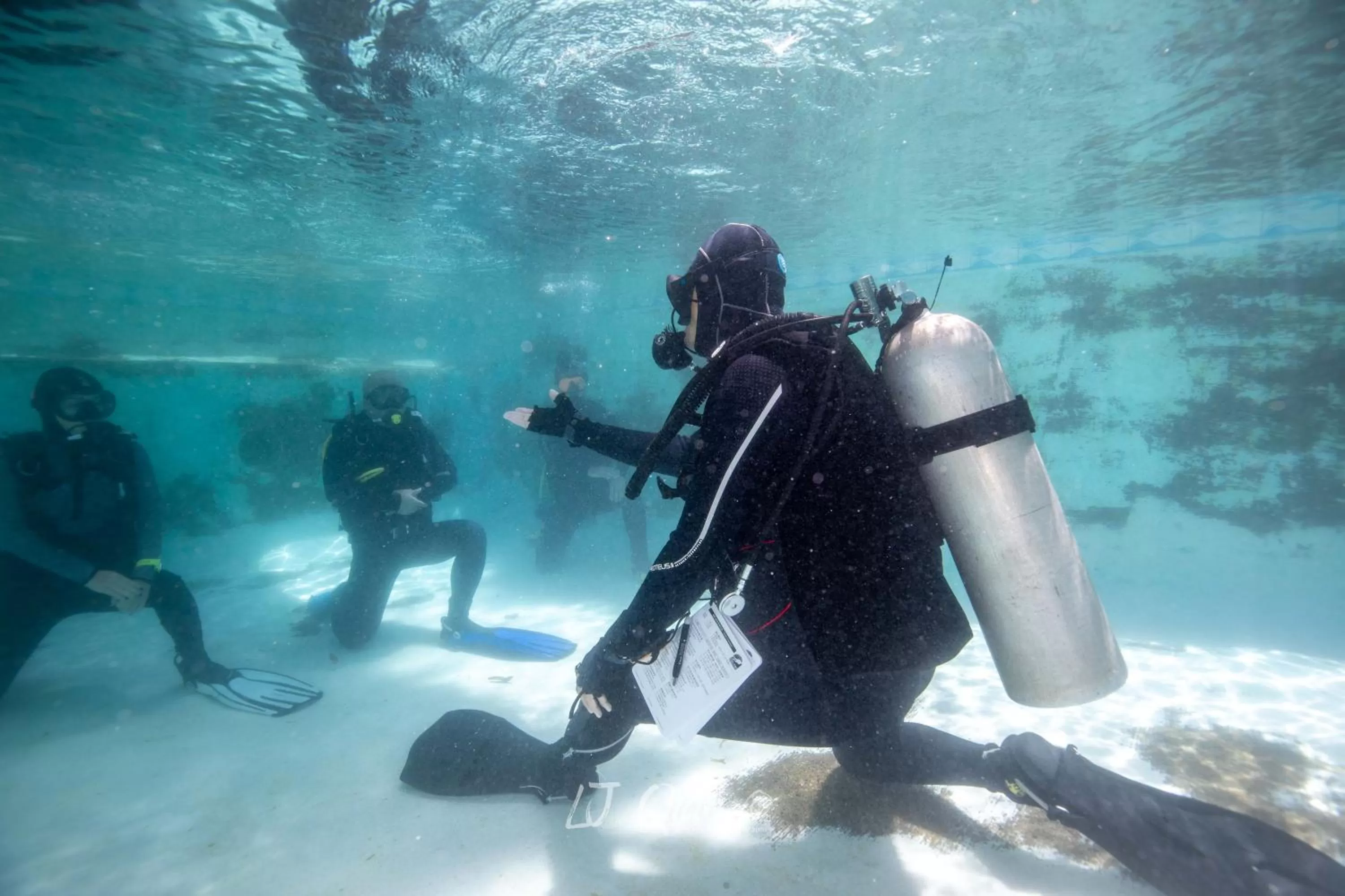 People in Sugarsea Inn & Dive shop
