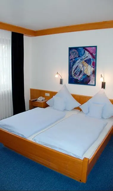 Photo of the whole room, Bed in Hotel Gülser Weinstube