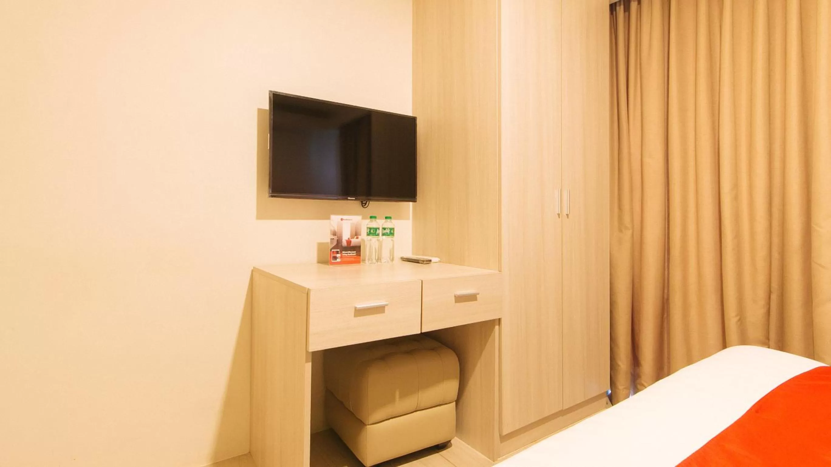 TV and multimedia, Bed in RedDoorz Plus at La Belle Residences Makati City