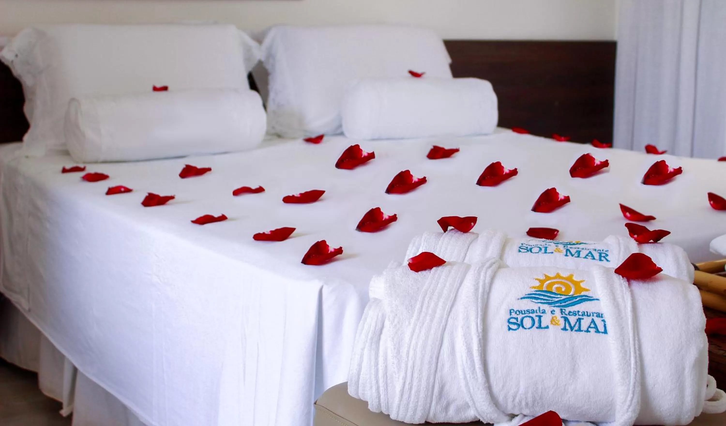 Bed in Pousada Sol e Mar