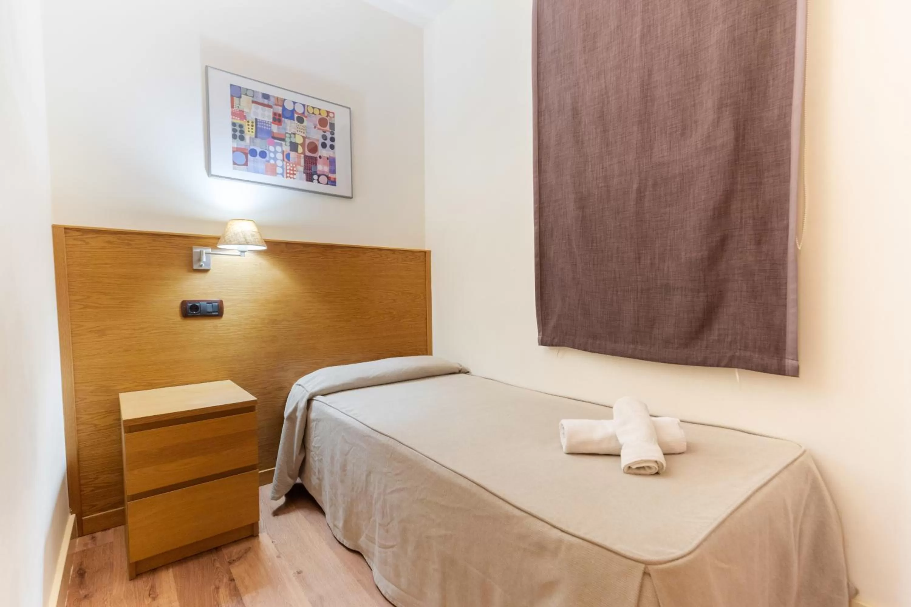 Bed in Atica Apartments - by Weflating