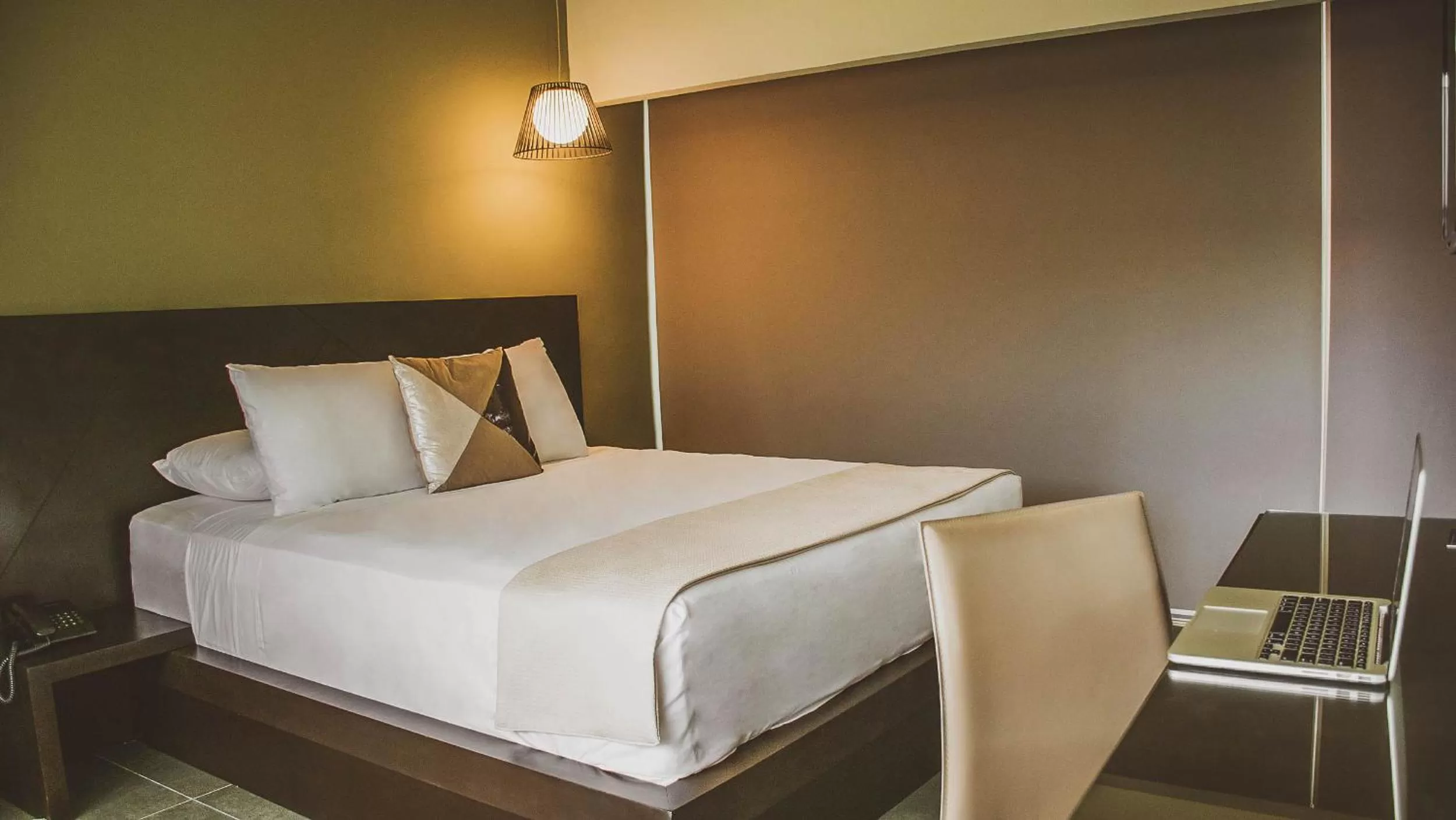 Bed in Remfort Hotel