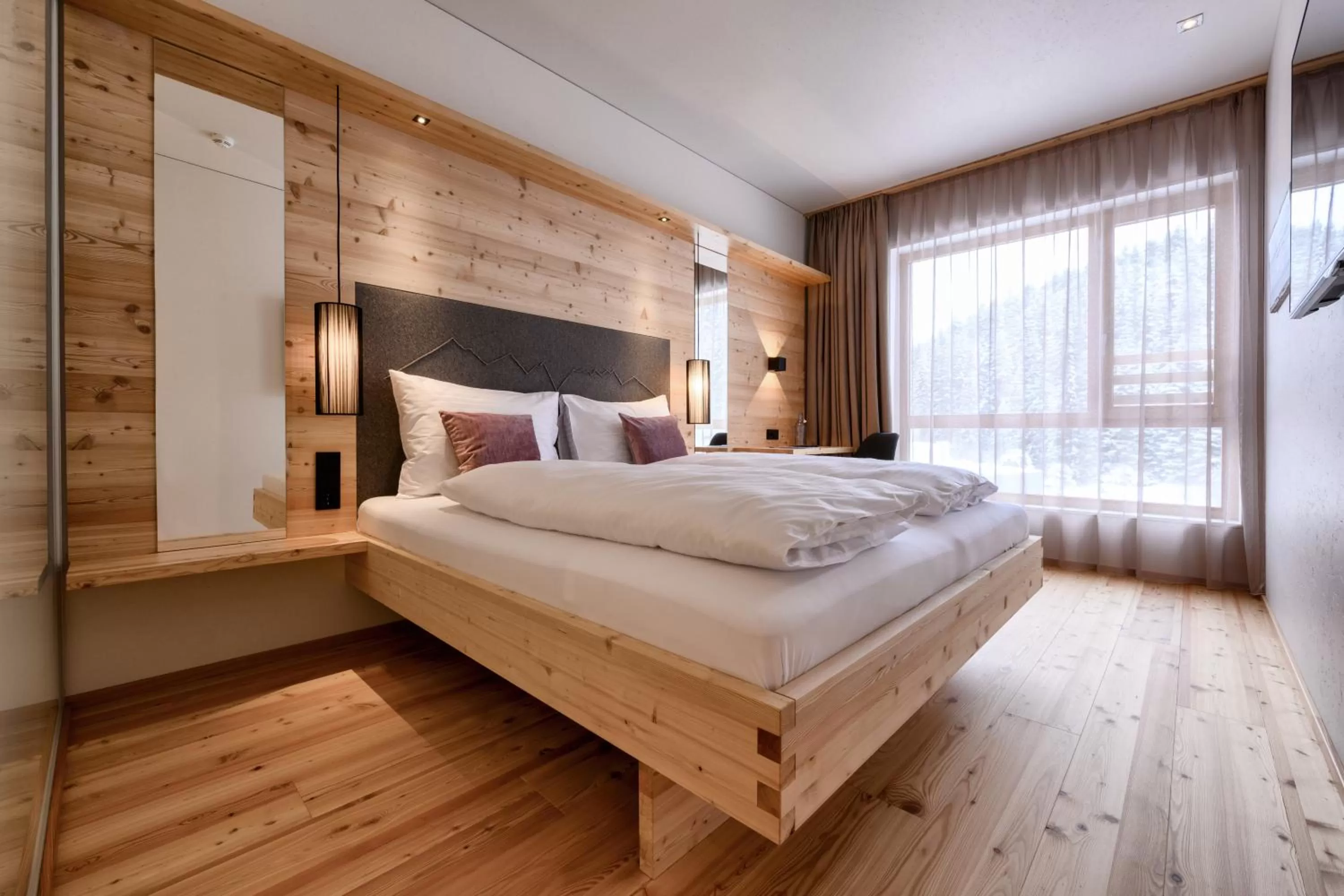 Bed in Tirol Lodge