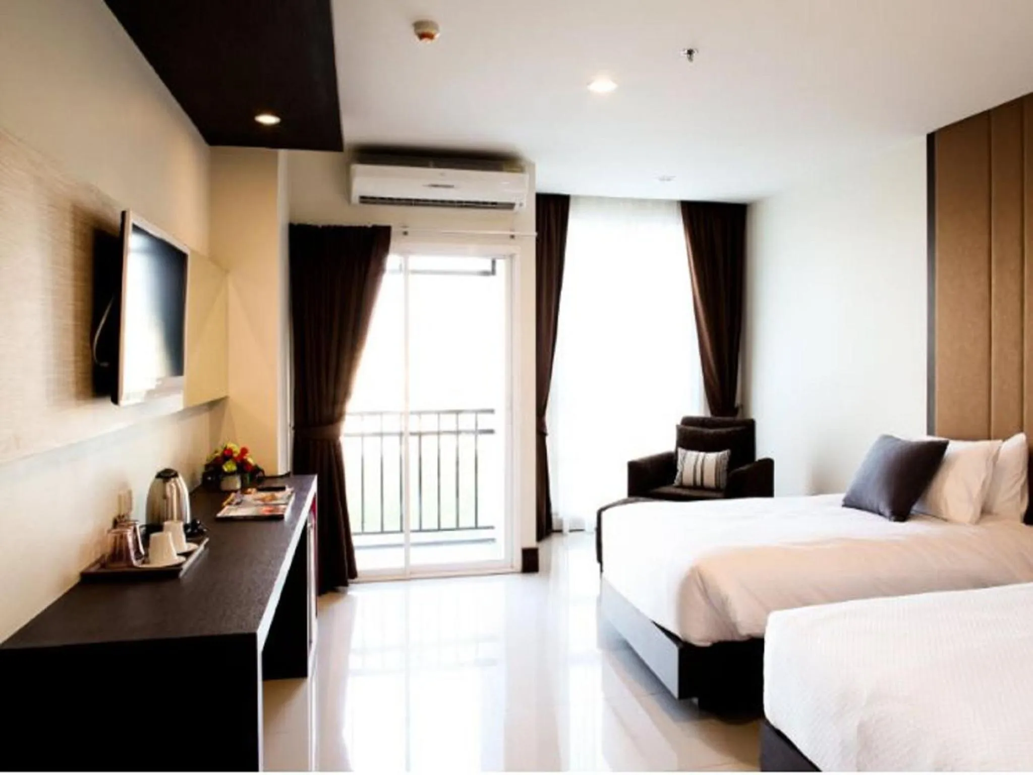 Photo of the whole room, Bed in Crystal Suites Suvarnbhumi Airport