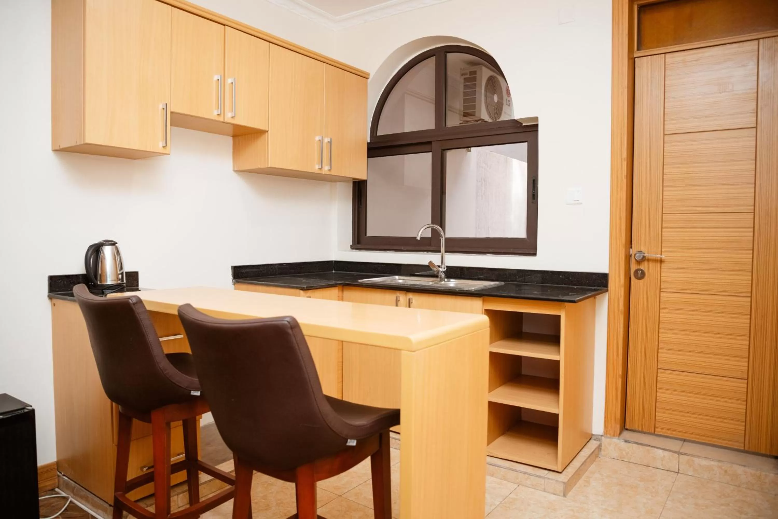 Kitchen or kitchenette in Ndaru Luxury Suites