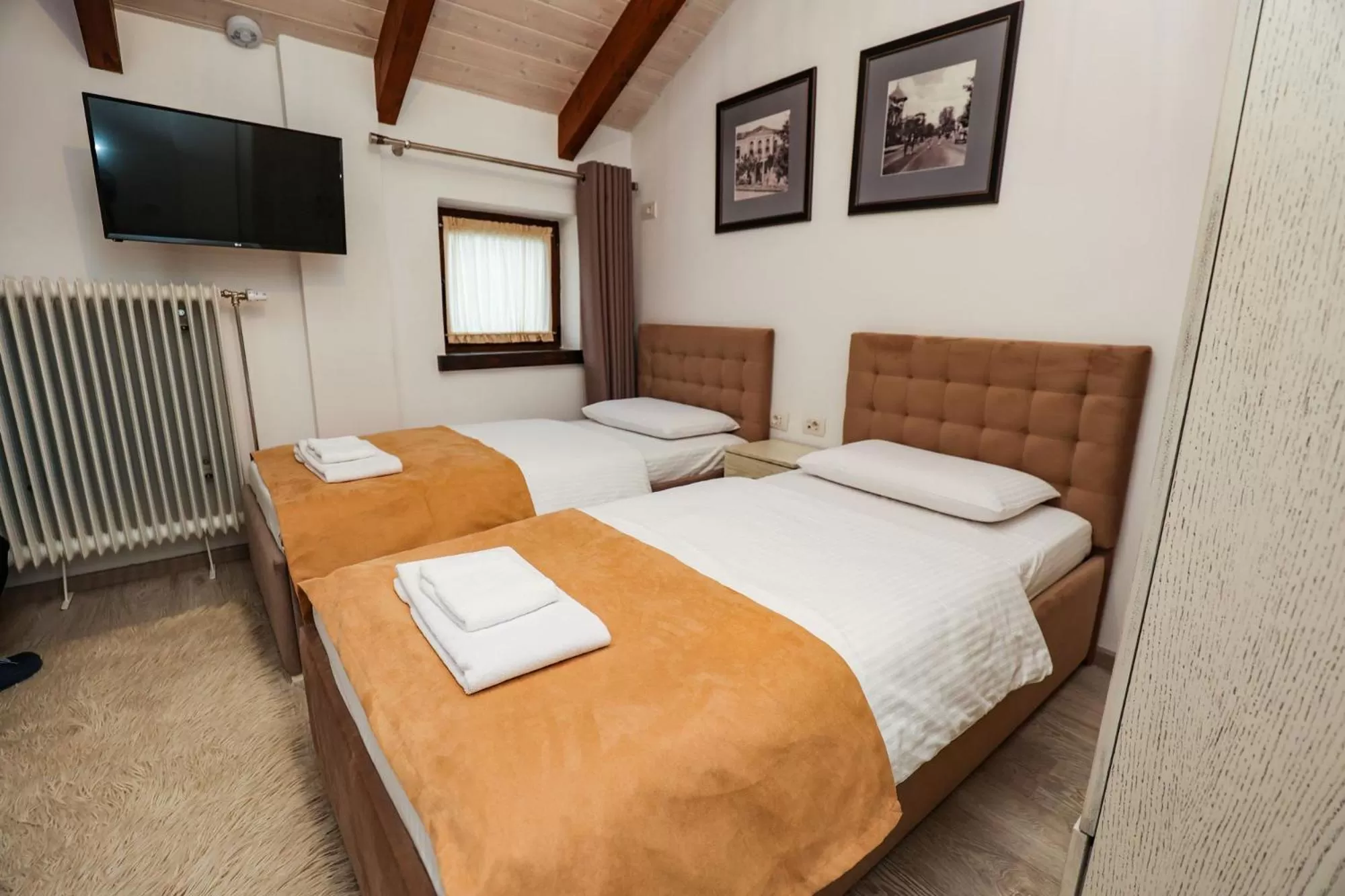 Photo of the whole room, Bed in Bujtina Oxhaku