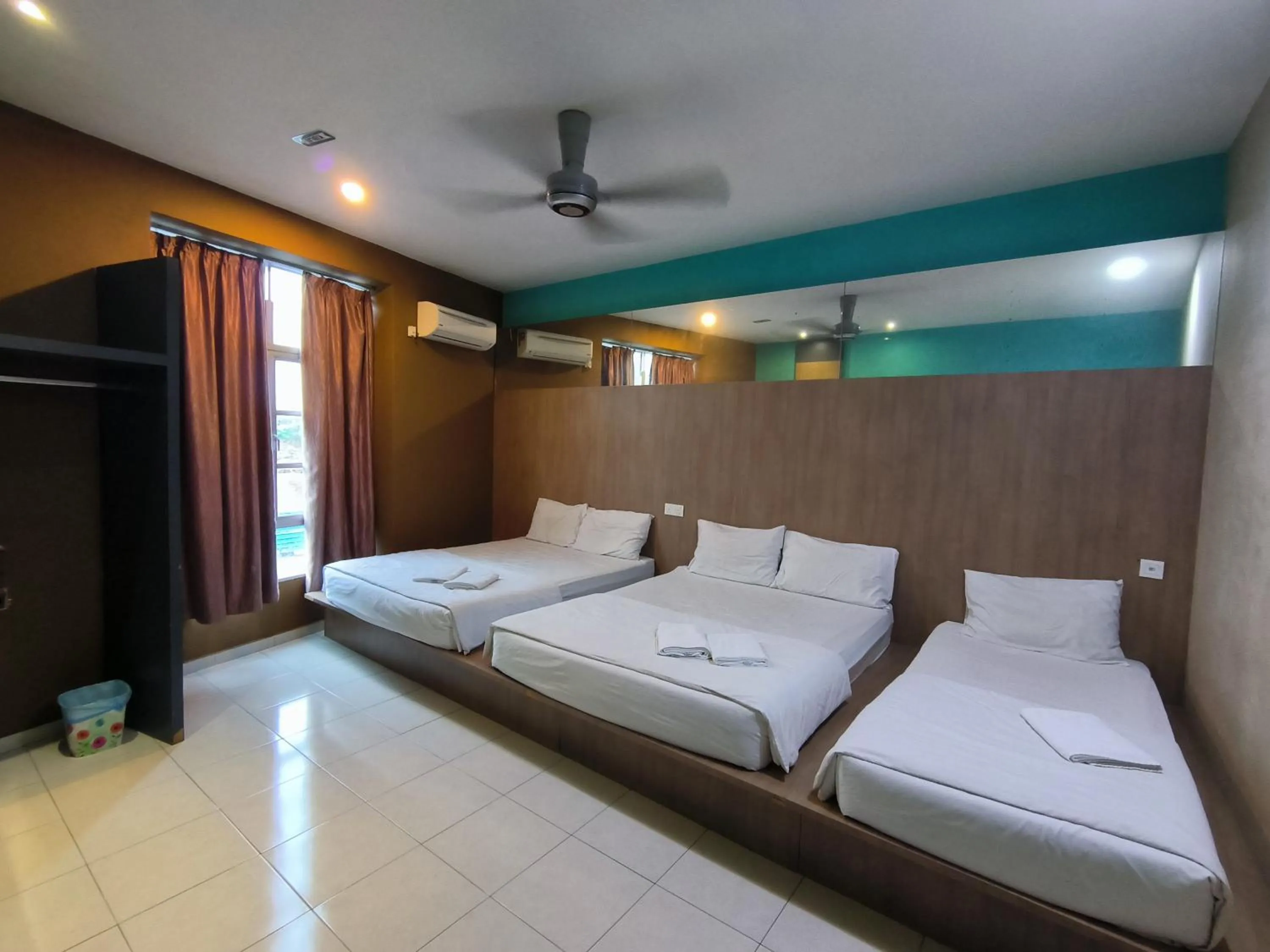 Bed in GOLDEN GUEST HOUSE KUANTAN
