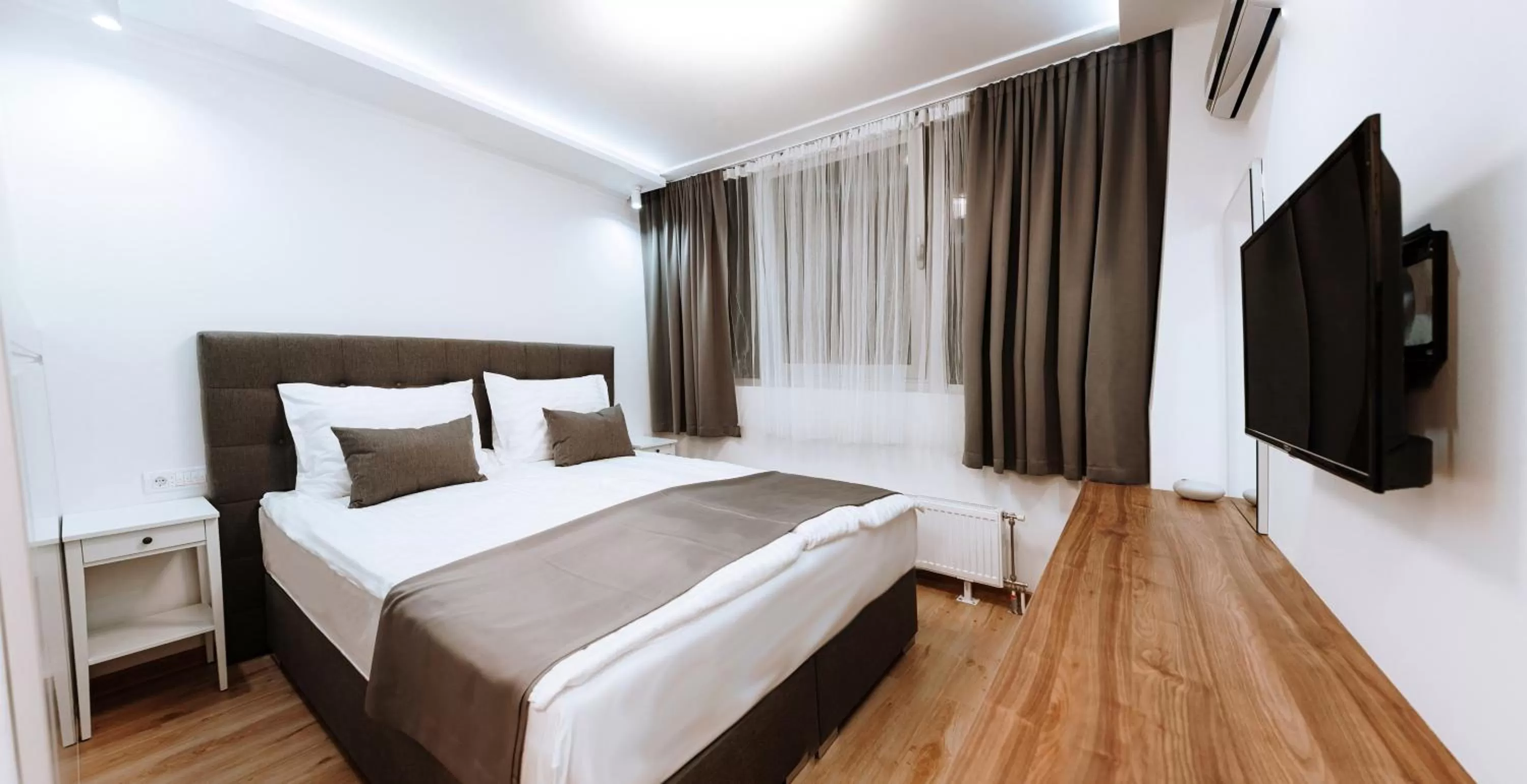 Bed in Boutique Hotel Nea