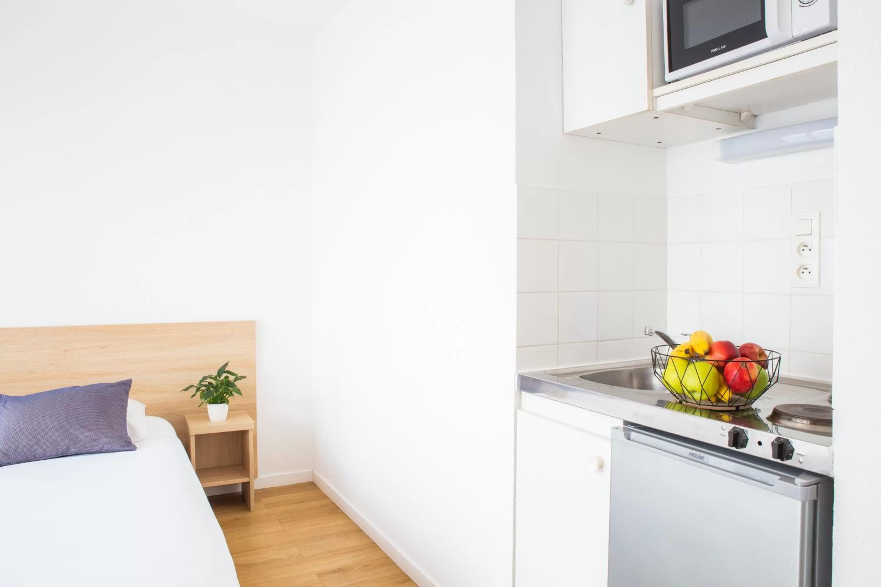 Kitchen or kitchenette in Comfort Aparthotel Le Mans