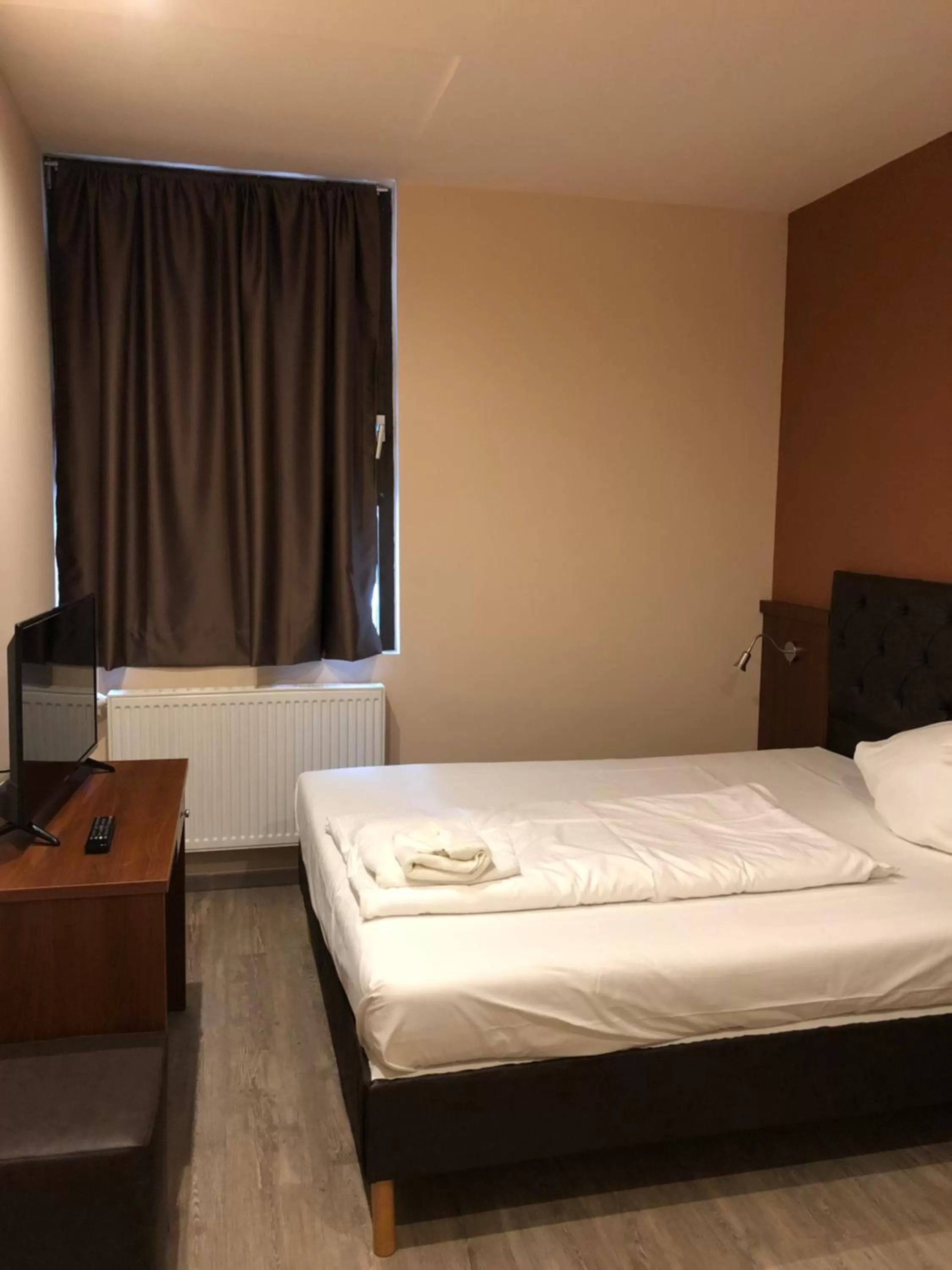 Bed in Hotel Poseidon