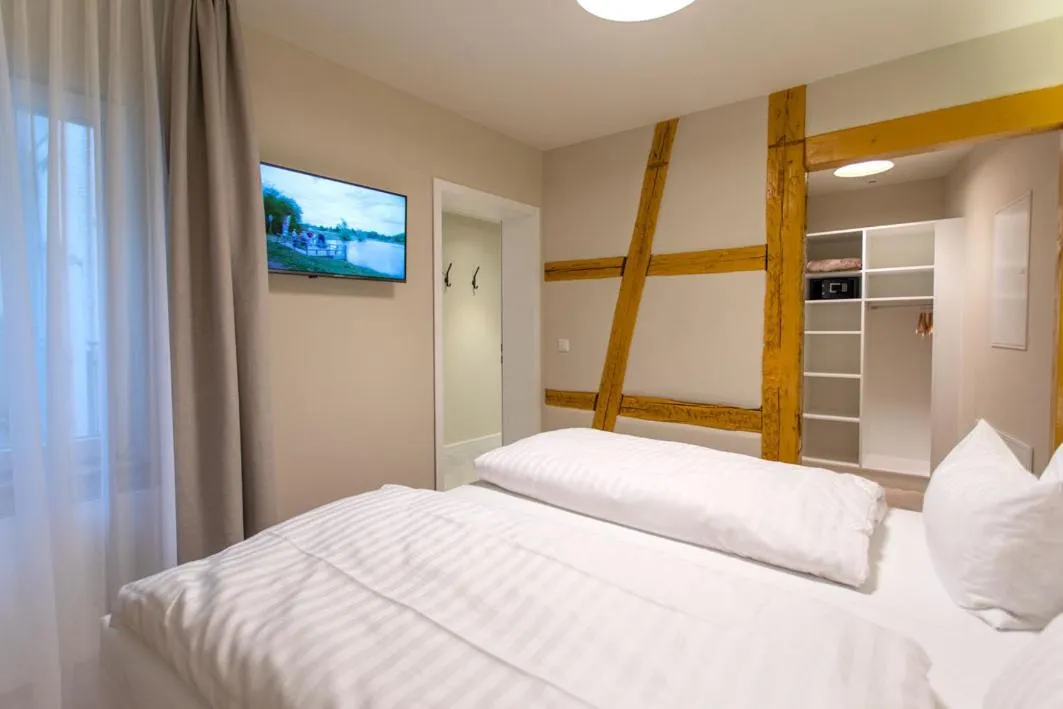 Bedroom, Bed in Hotel Tuchhaus