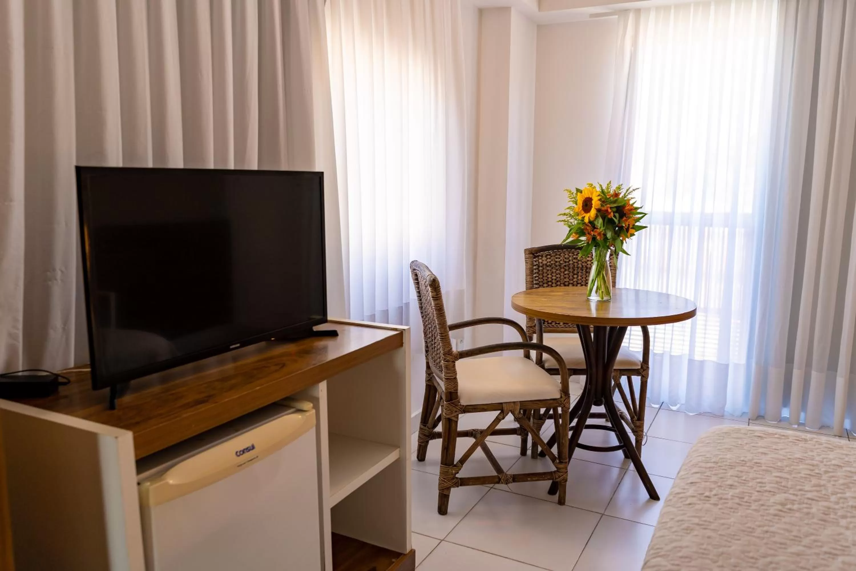 TV and multimedia in Porto Suítes Natal Hotel