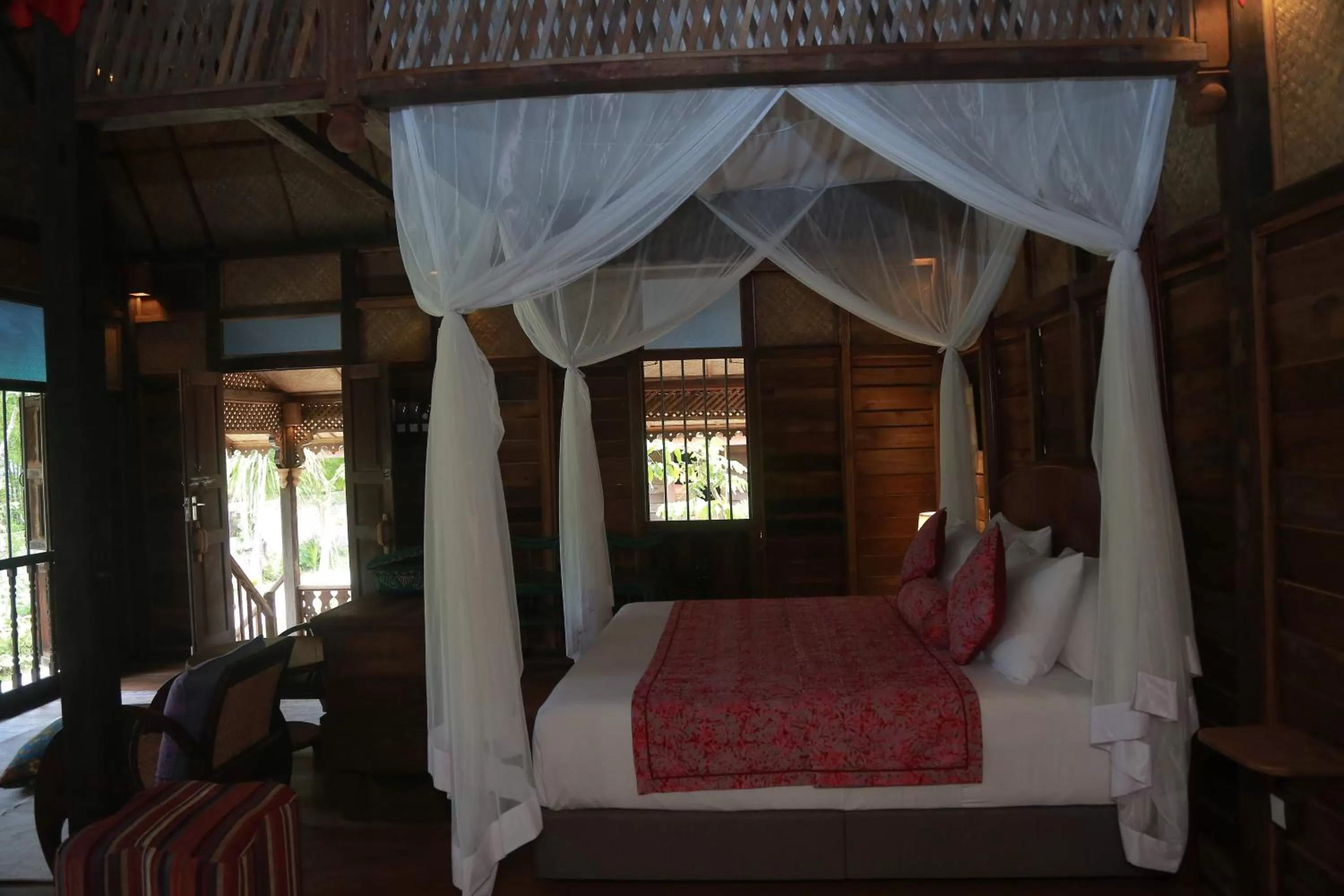 Bed in Kunang Kunang Heritage Villas