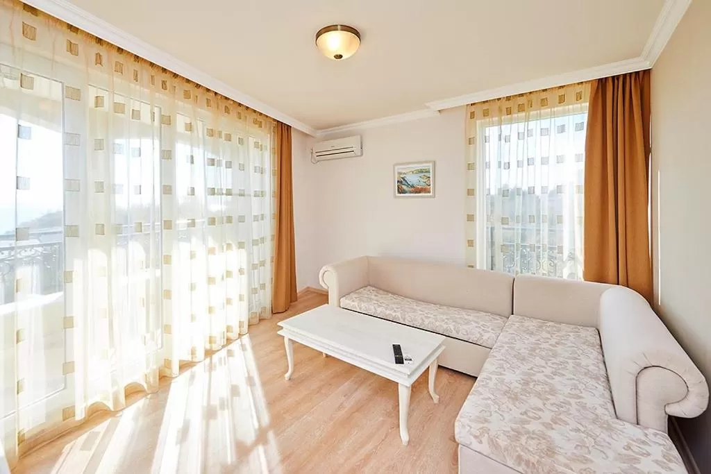 Seating area, Bed in Penelopa Palace Apart Hotel & SPA