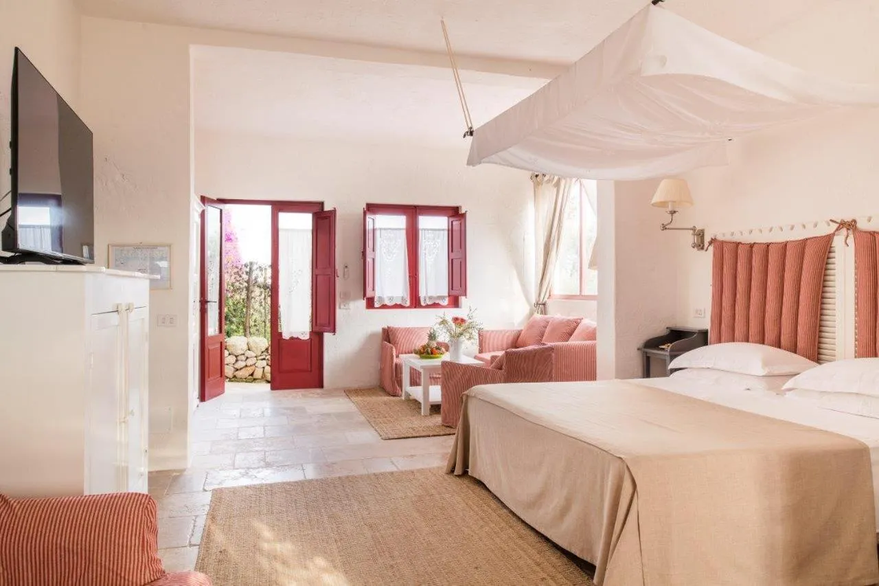 Photo of the whole room, Bed in Masseria Torre Coccaro