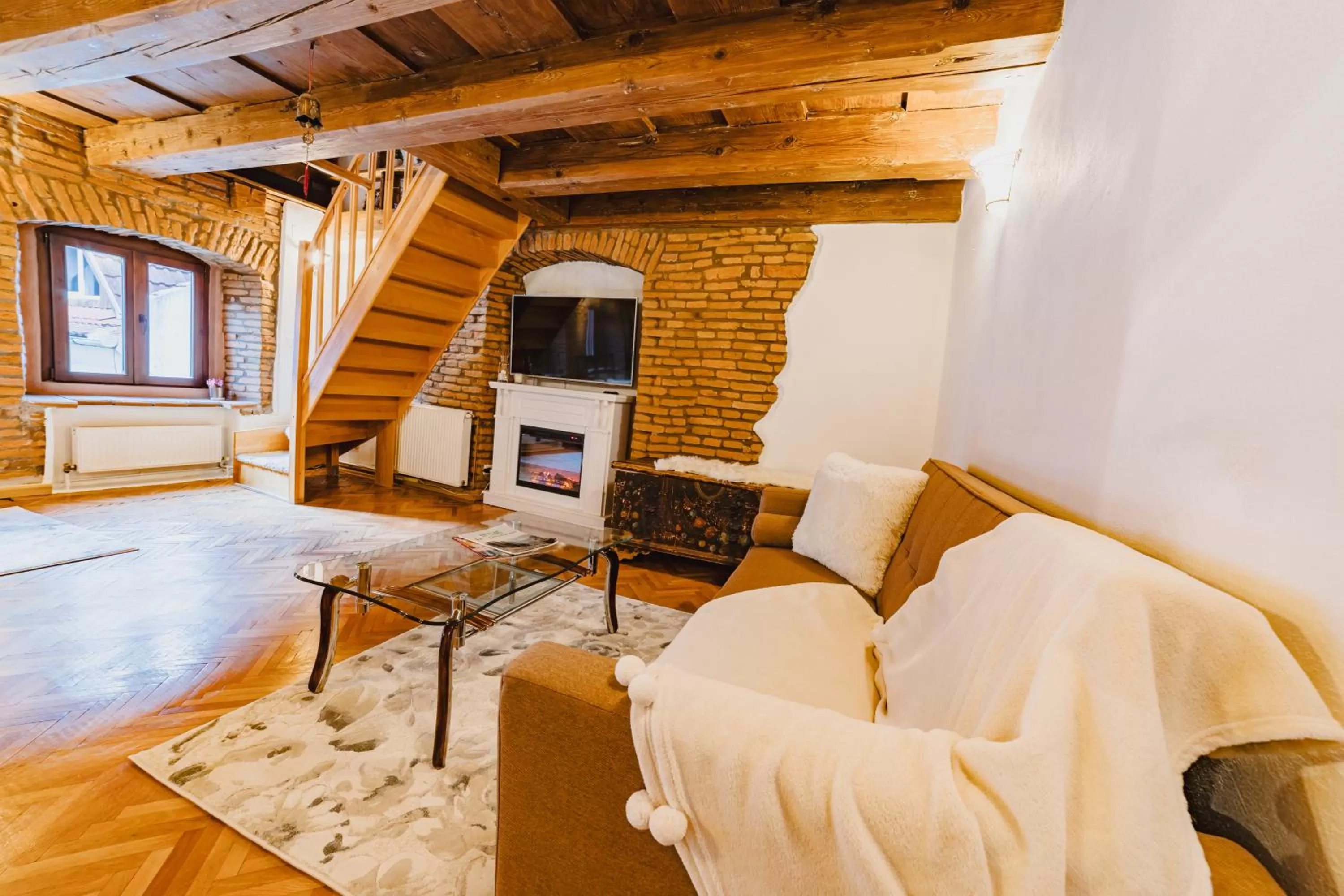 Living room in ALBERT RESIDENCE Brasov with complimentary parking and 10 percent Food and Drinks