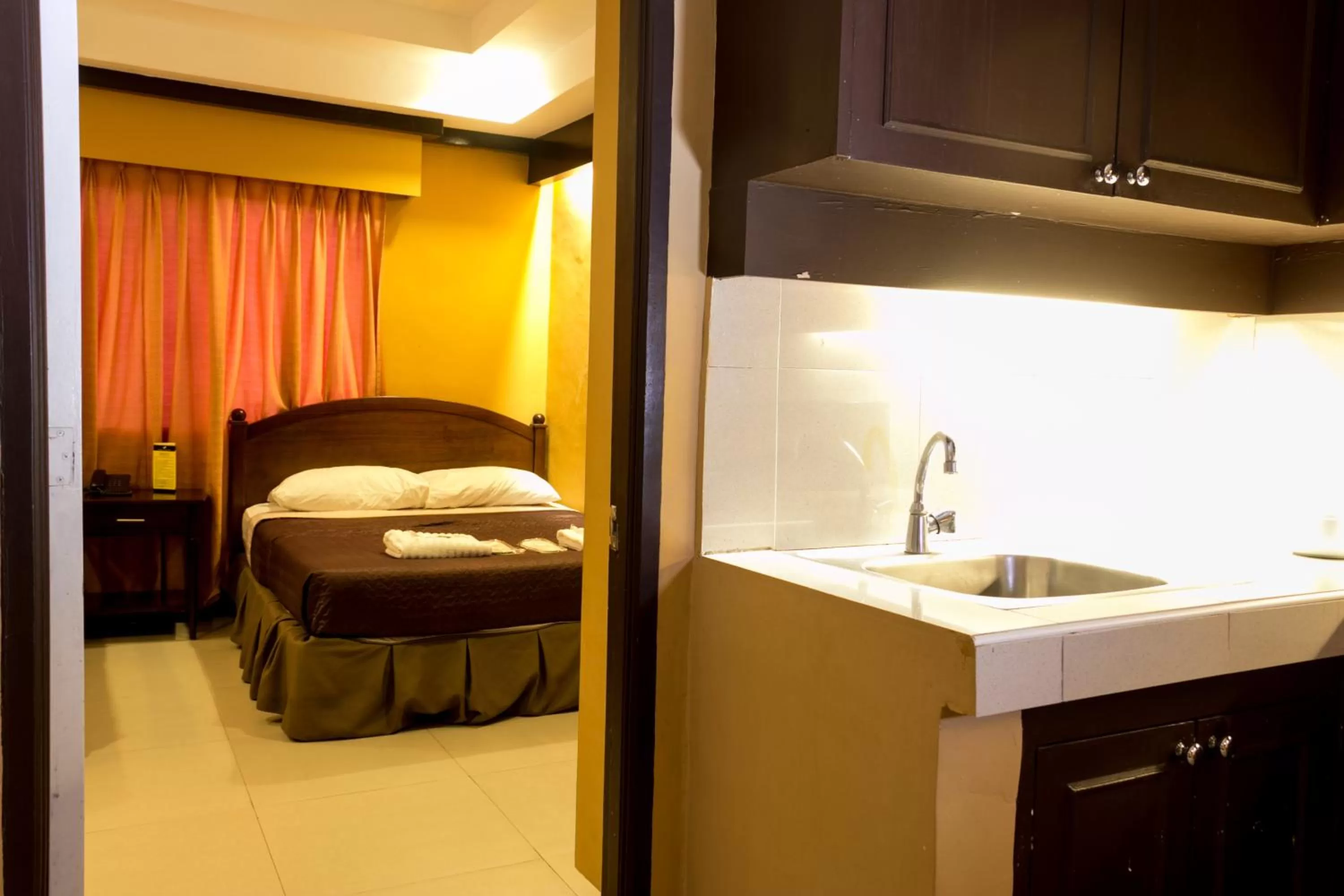 Kitchen or kitchenette, Bed in Tagaytay Country Hotel