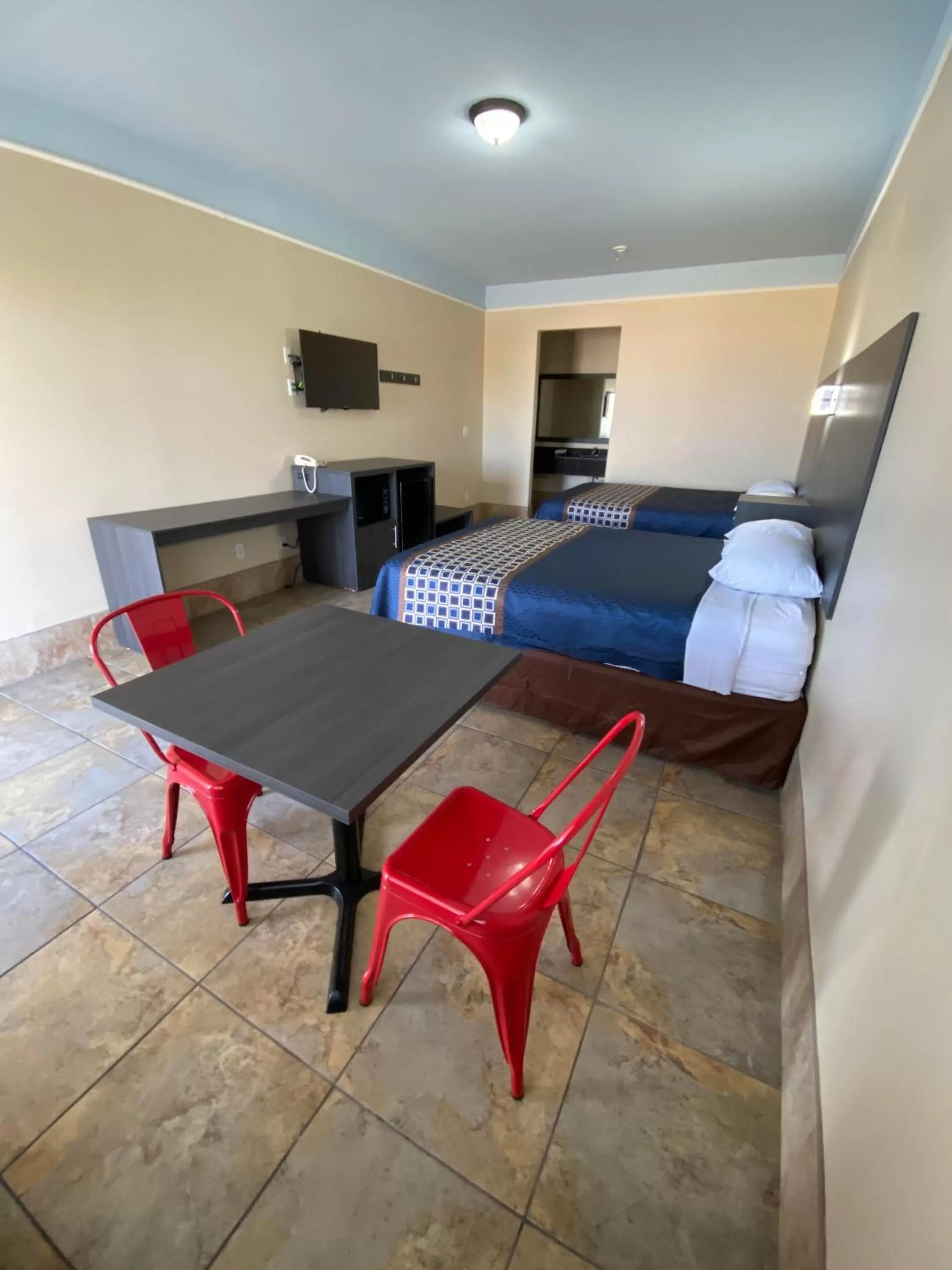 Bedroom in Texas Inn & Suites McAllen at La Plaza Mall and Airport