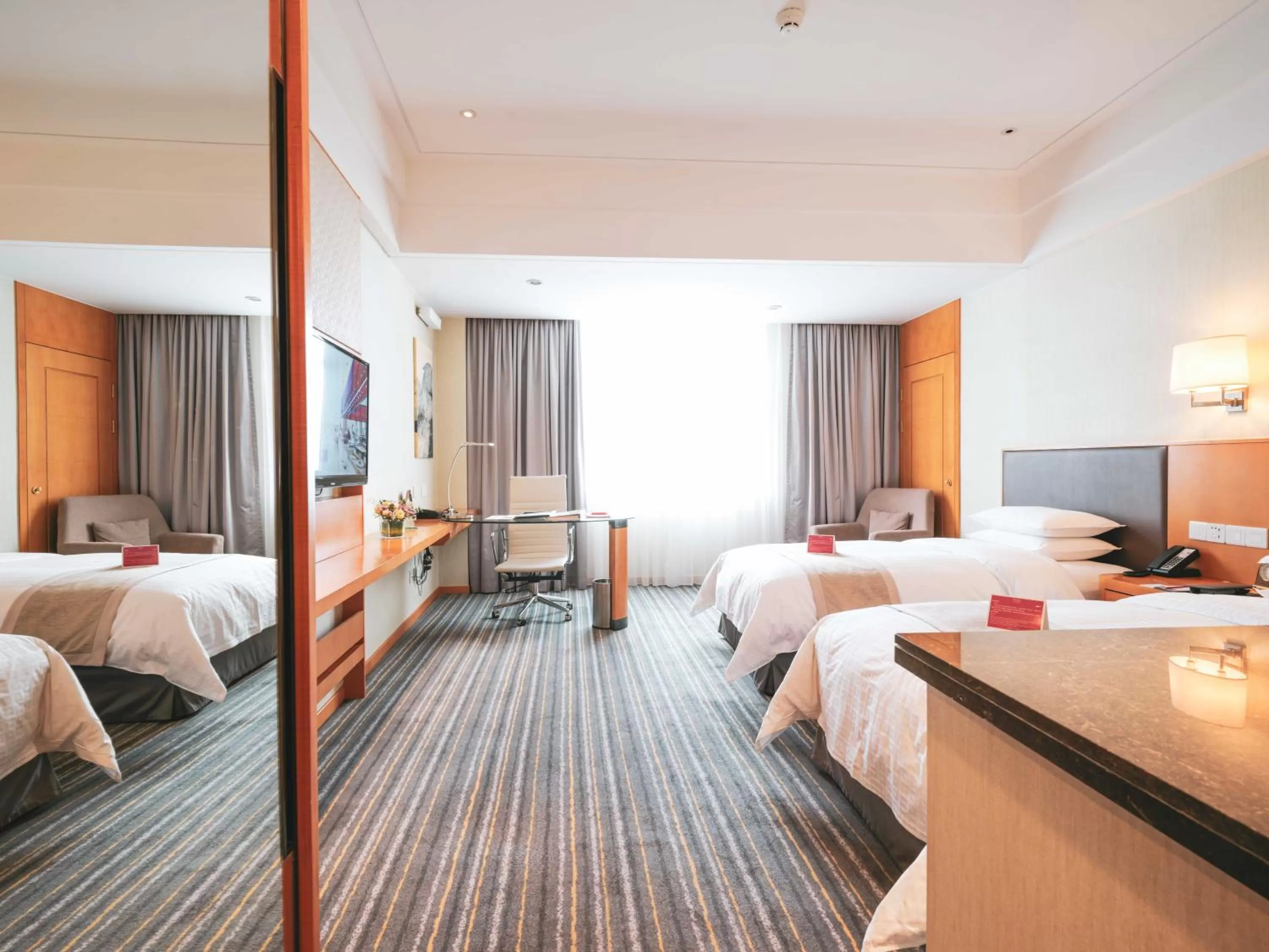 Bed in Ramada Plaza Shanghai Pudong Airport - 3 mins to PVG depature floor & check entrance with hotel shuttle