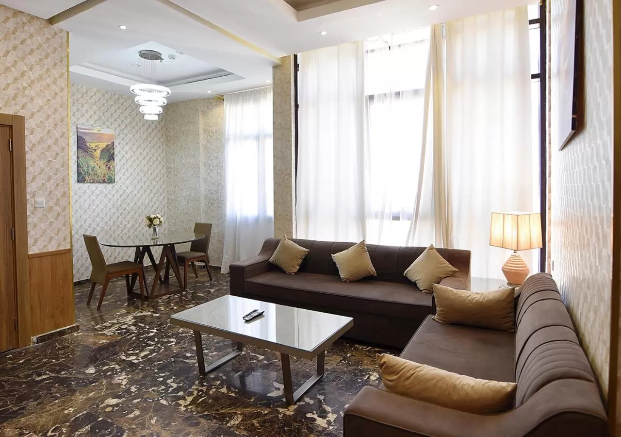 Communal lounge/ TV room, Seating Area in Rihanna Hotel Apartment