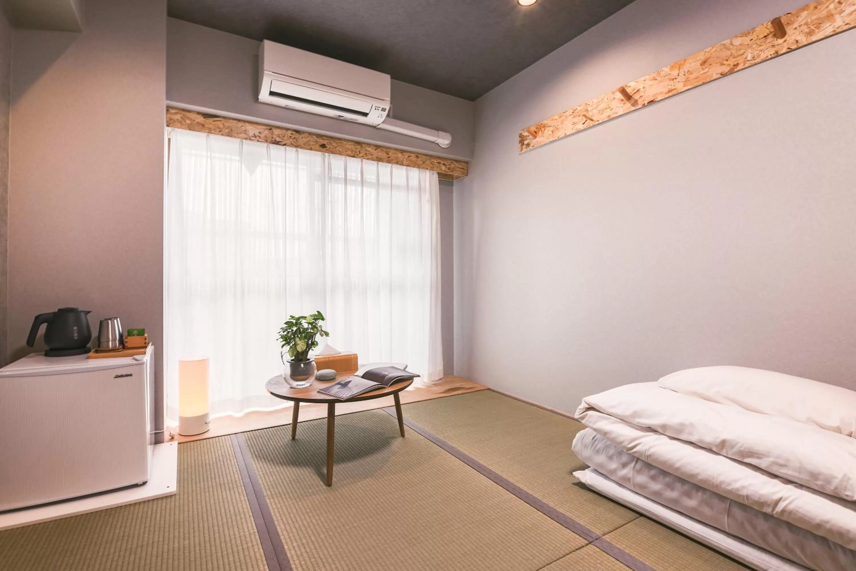 Bed in WAYFARER Kyoto Shijo