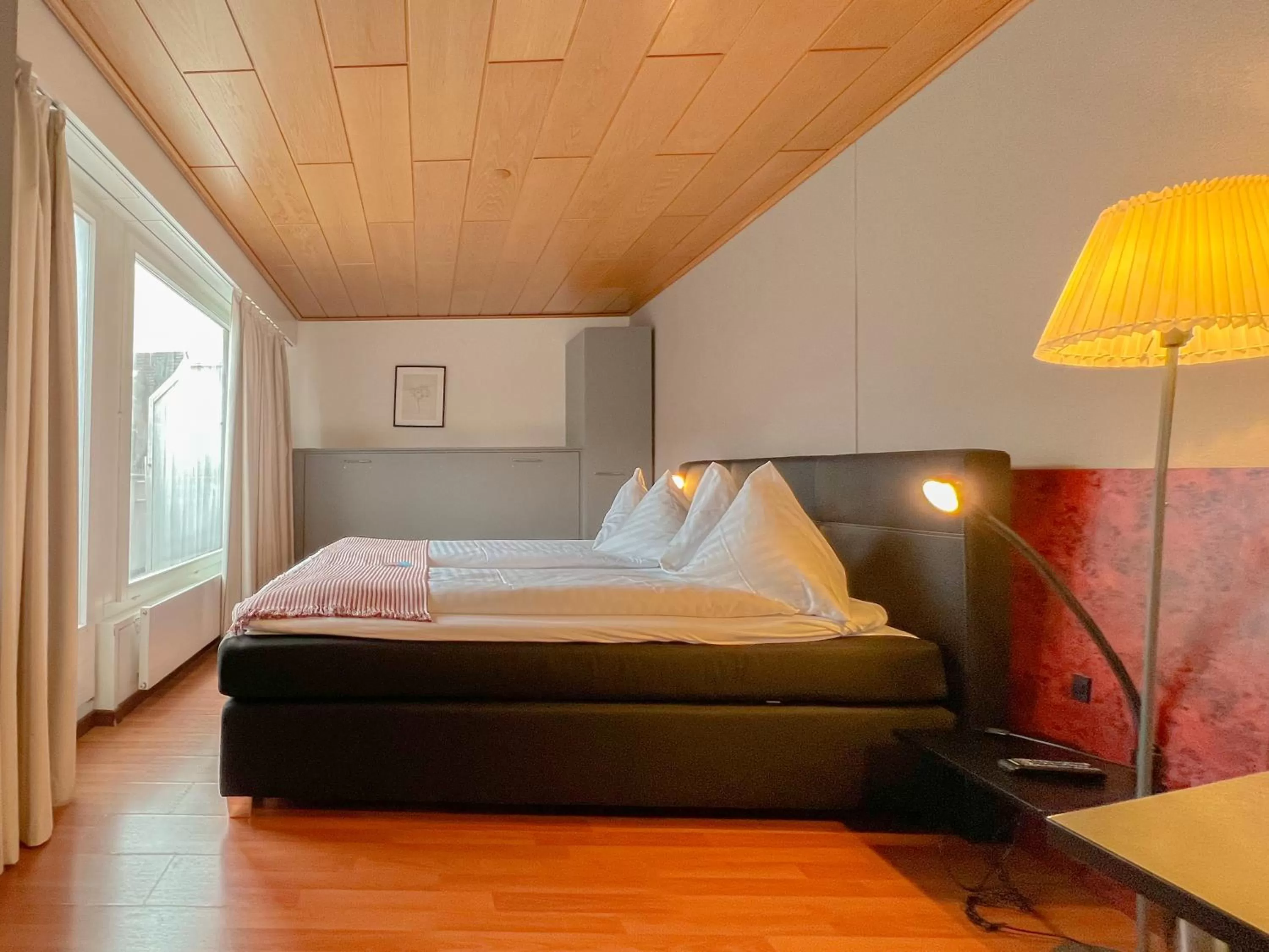 Bed in Hotel Rothaus Luzern & Peruvian Culinary Art