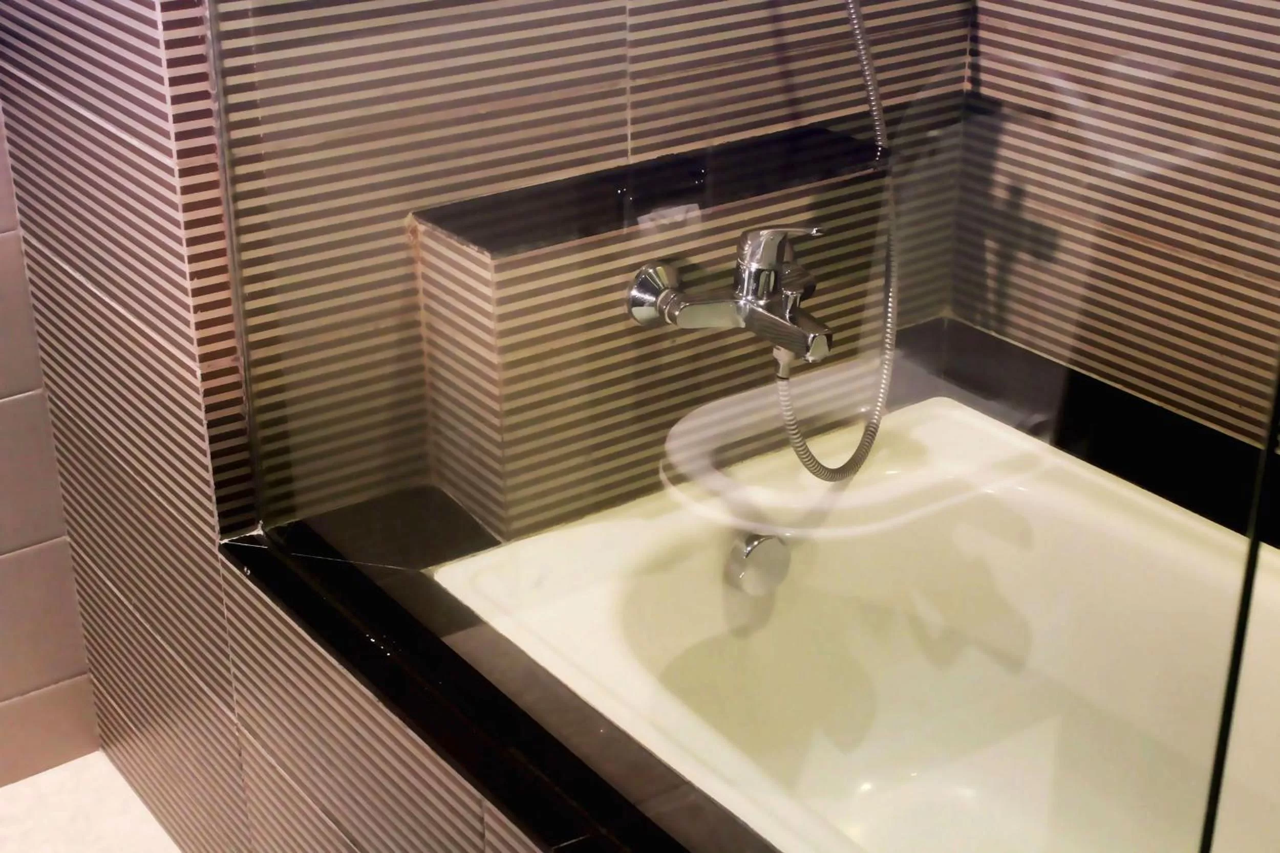 Bathroom in 100 Sunset Kuta Hotel & Ballroom