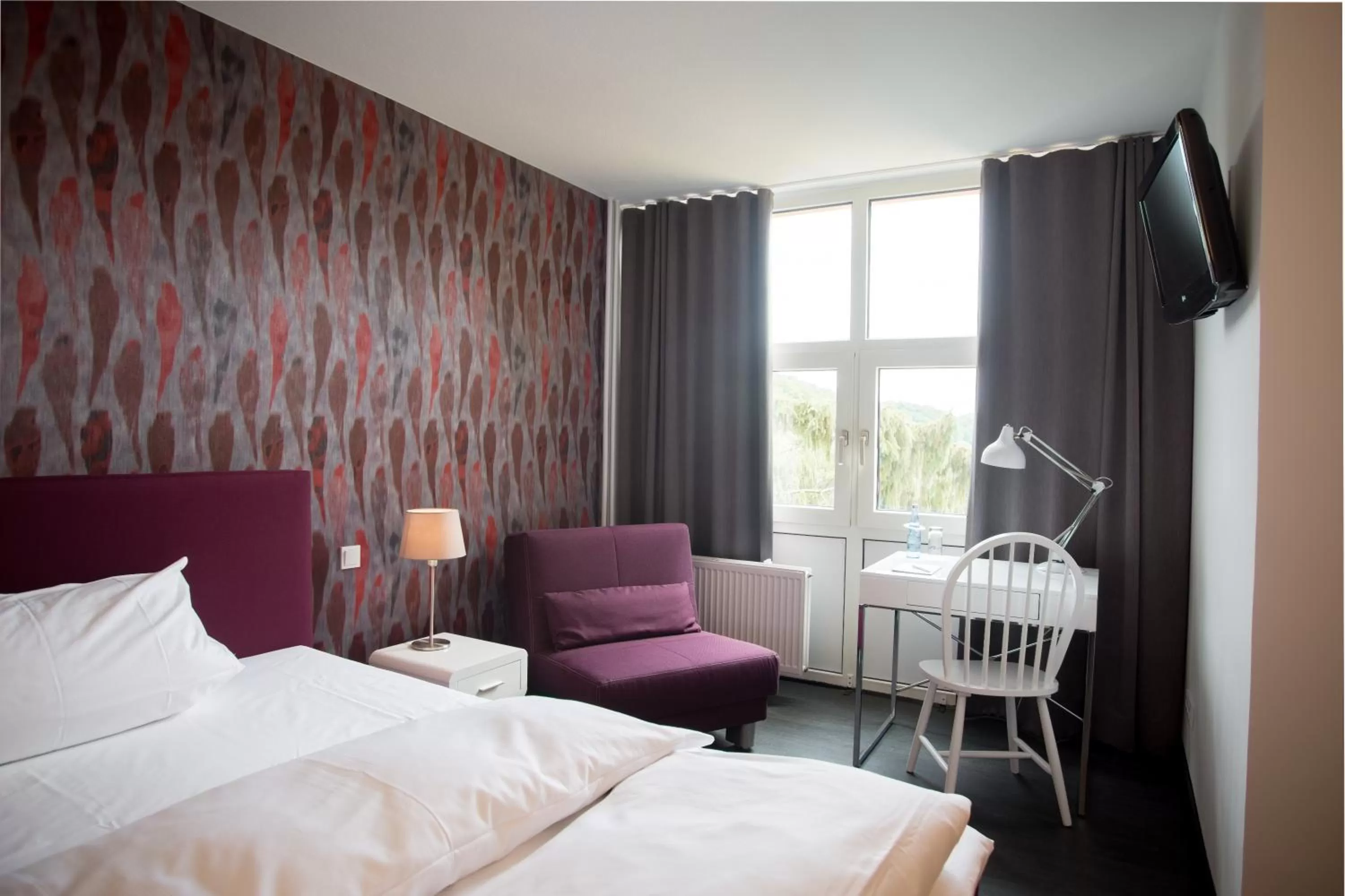 Photo of the whole room, Bed in Wald & Golfhotel Lottental