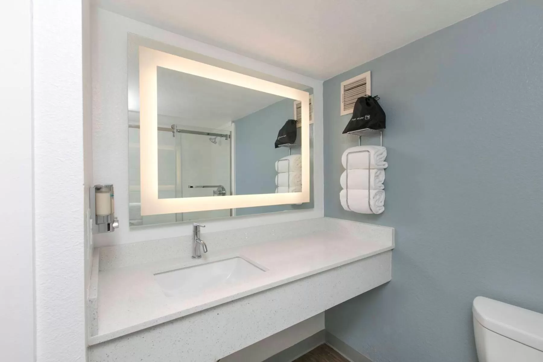 Bathroom in voco College Station Aggieland by IHG