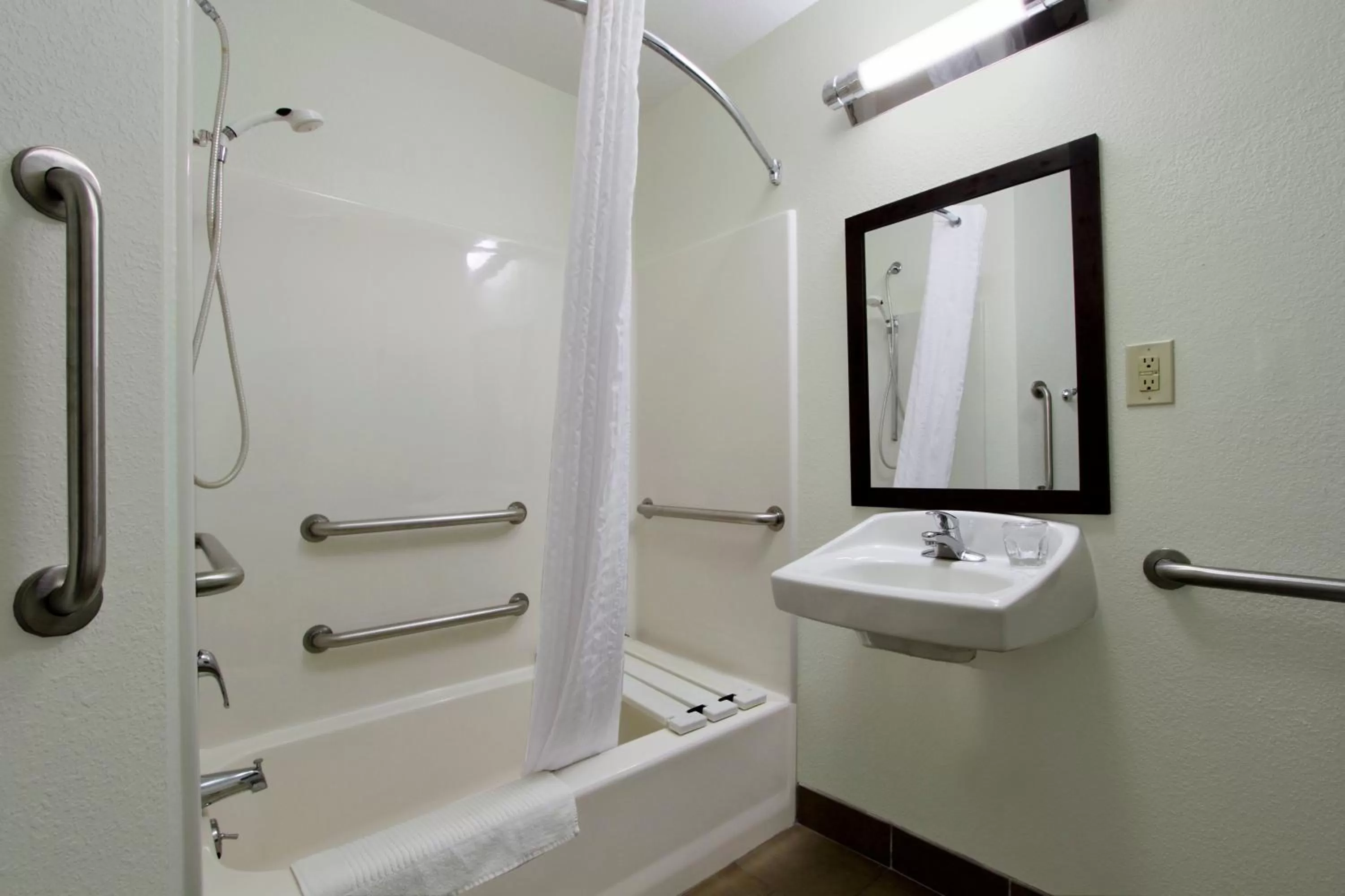 Bathroom in Candlewood Suites Rogers-Bentonville by IHG