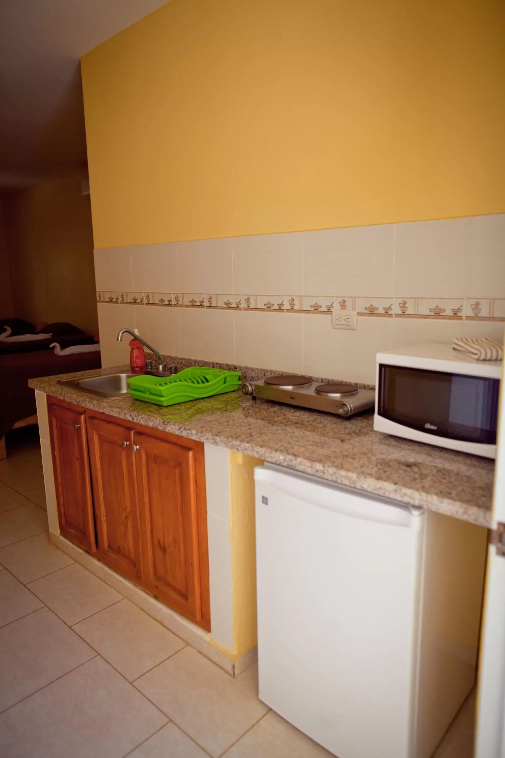 Kitchen or kitchenette in Kite Beach Inn