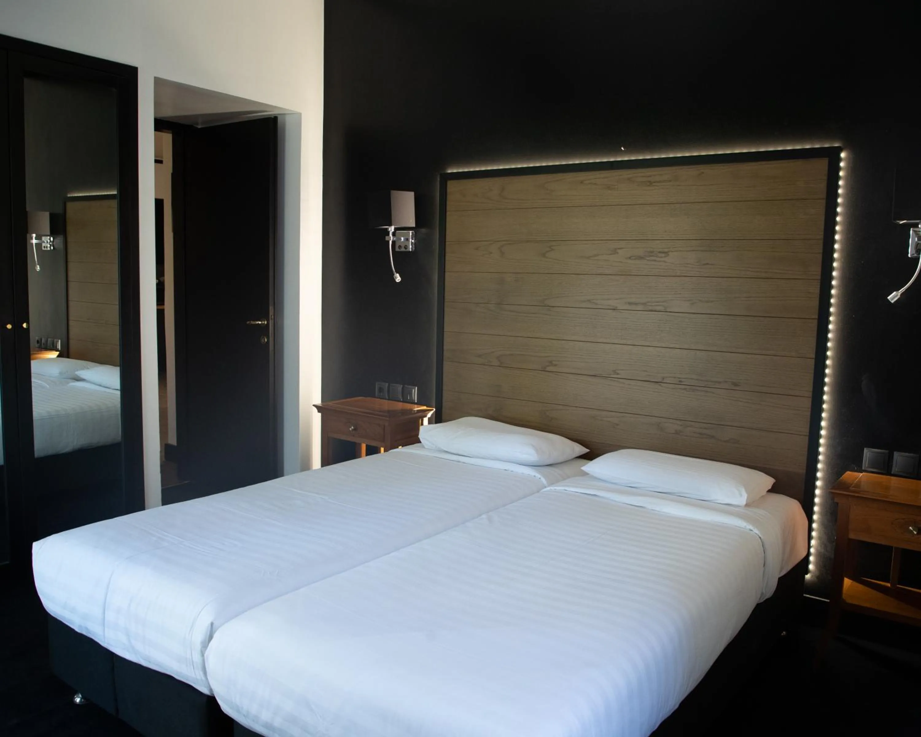 Bedroom, Bed in Andromeda Suites