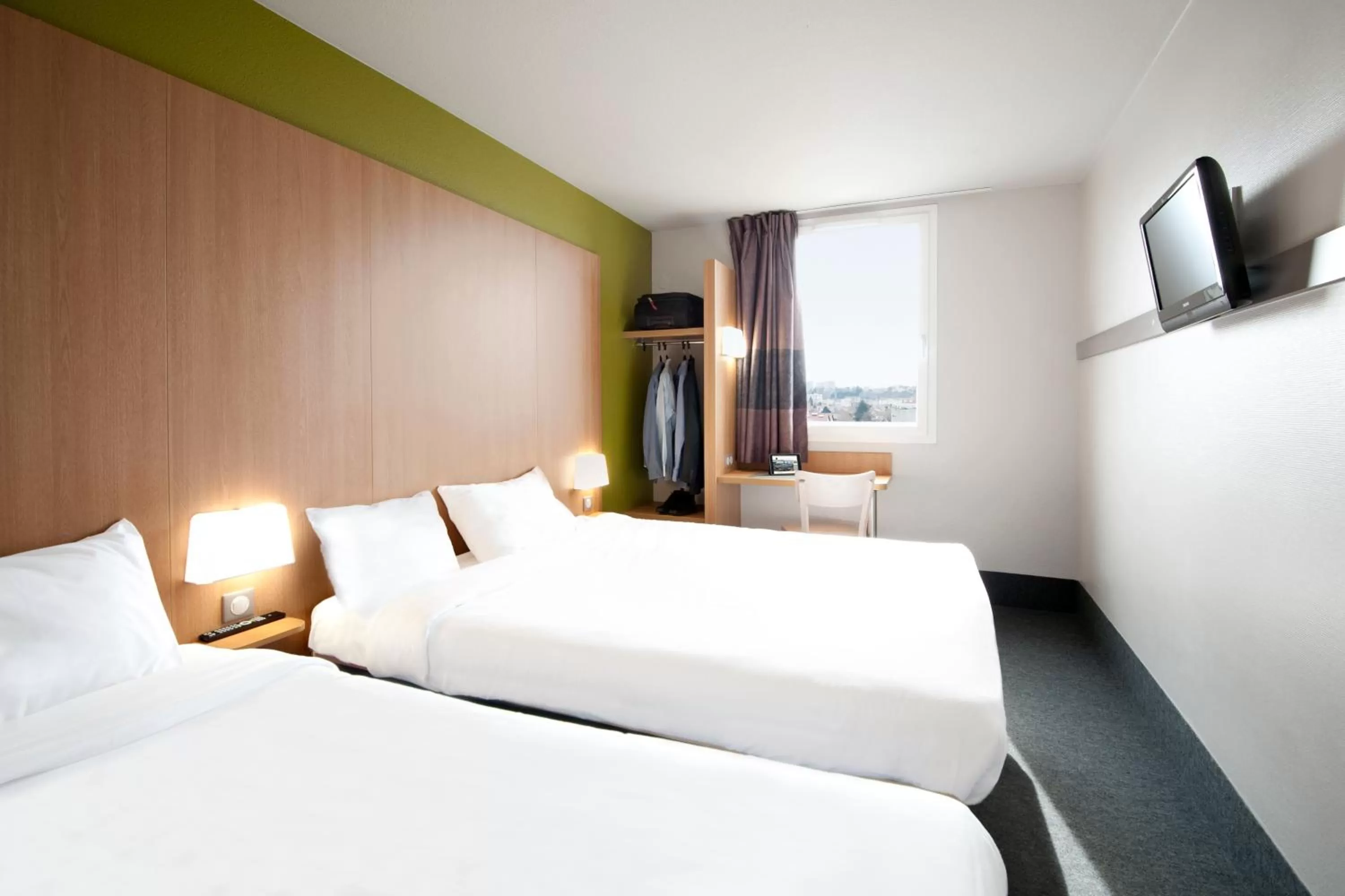 Photo of the whole room, Bed in B&B HOTEL Lyon Vénissieux