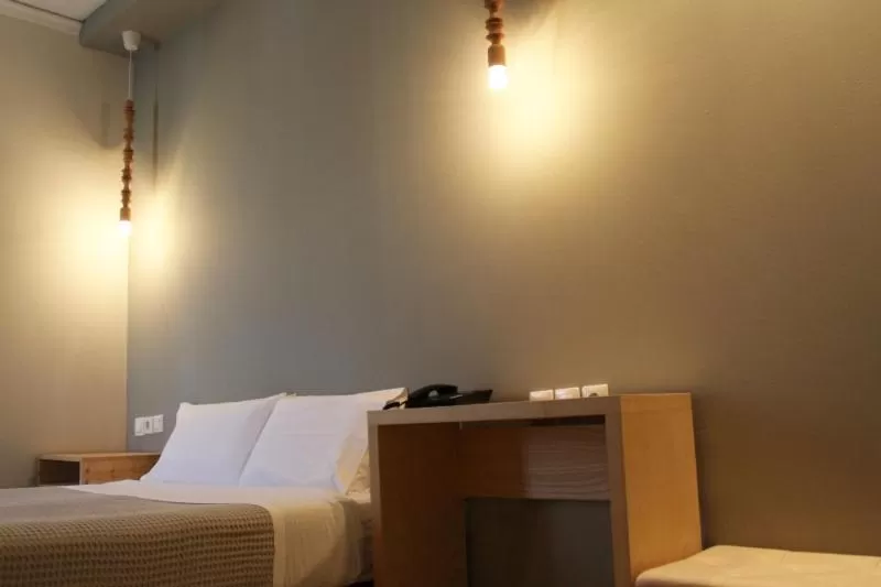 Bed in Messini Hotel