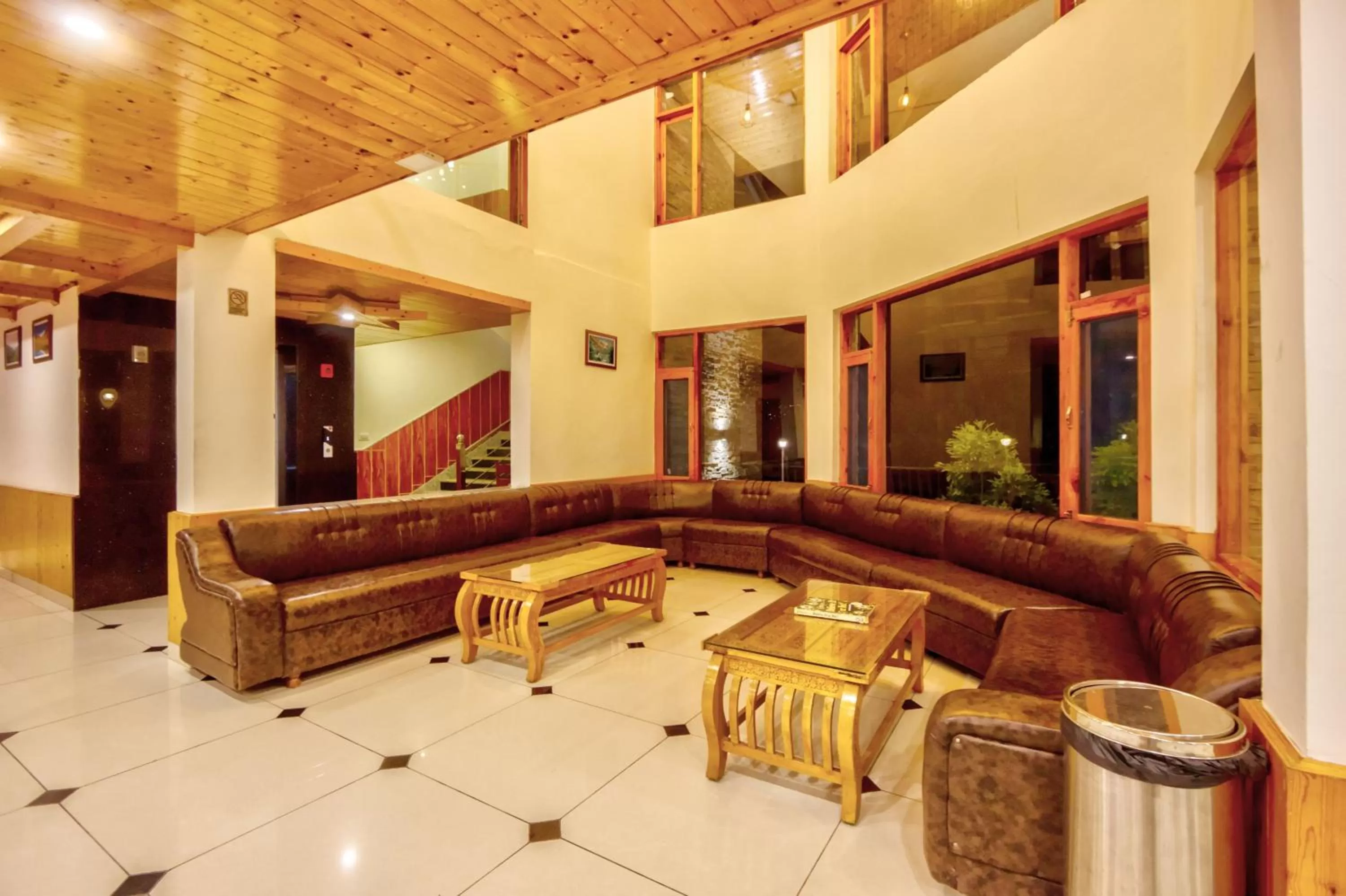 Seating area in Snow City's Montana Blues Resort Manali - Heated & Air-Cooled Stay