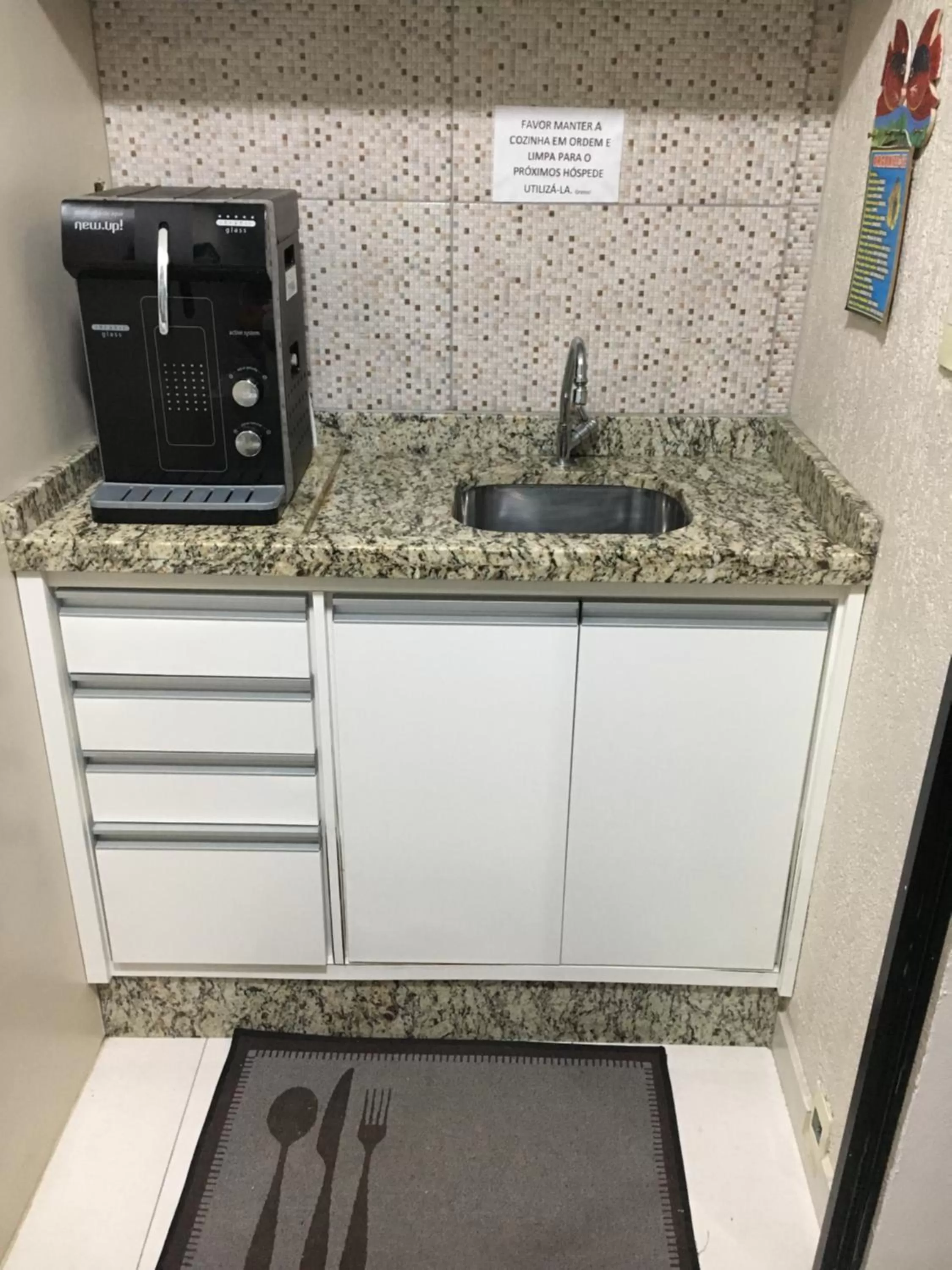 Kitchen or kitchenette in Pousada Rota das Praias