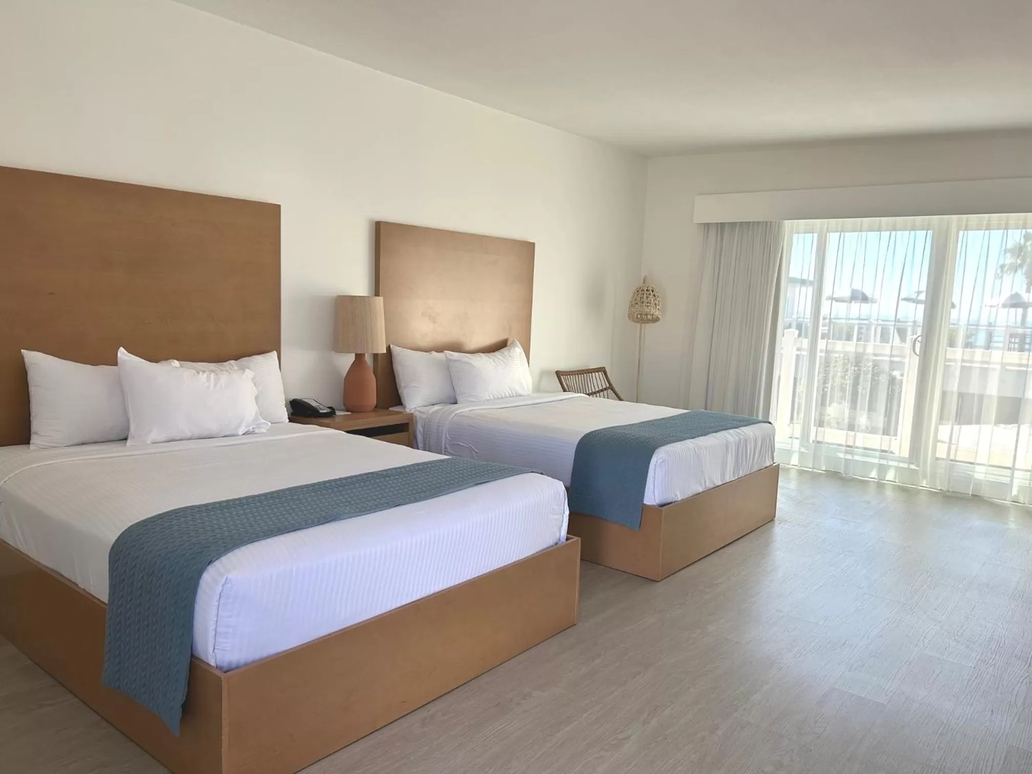 Bed in Capri Laguna on the Beach - A Boutique Hotel