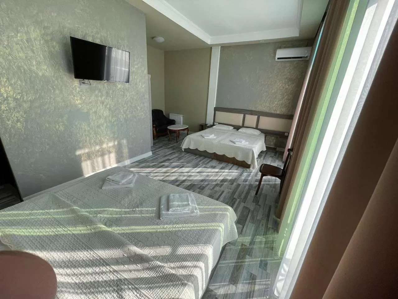 Bed in Discovery Hotel