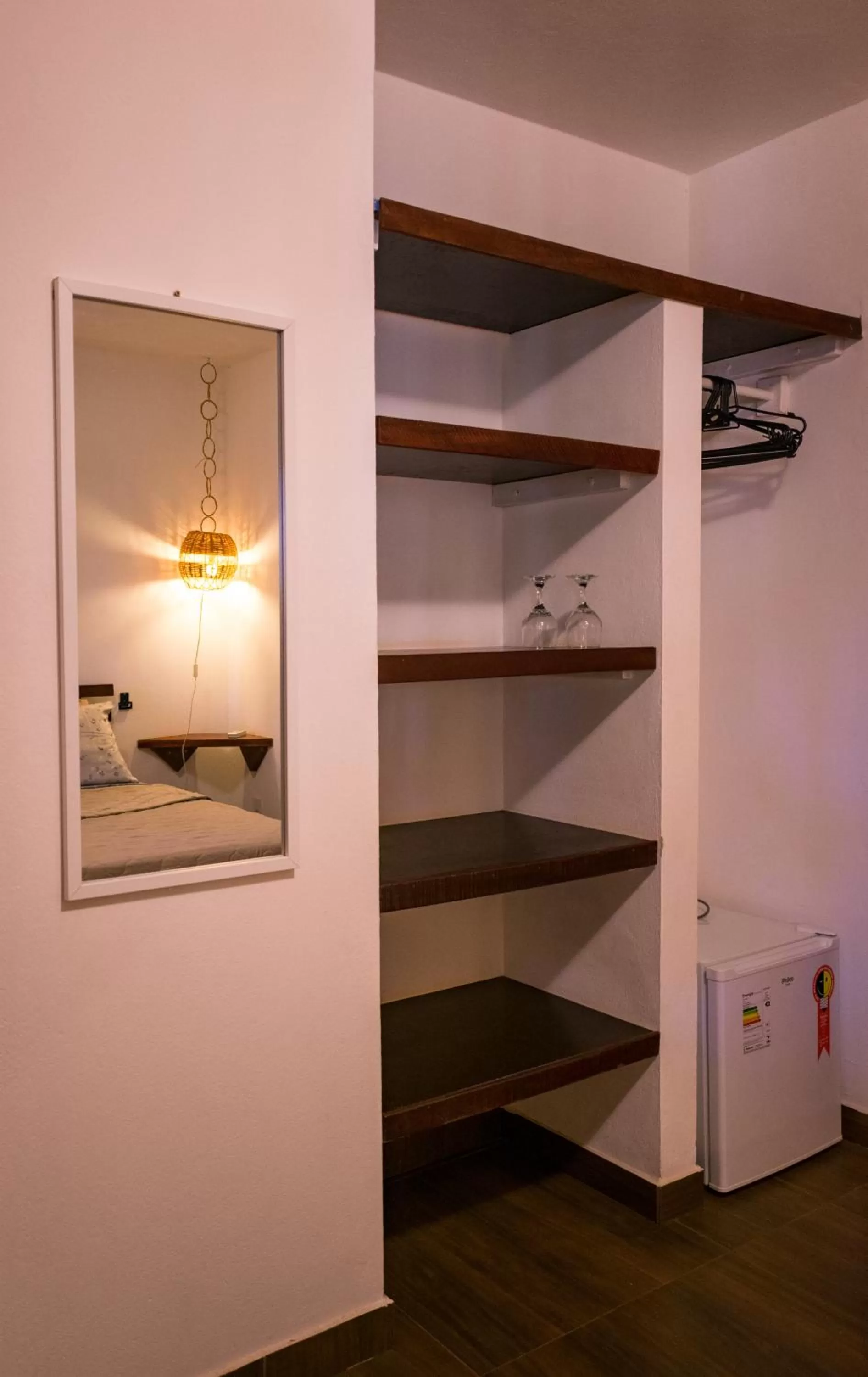 Photo of the whole room, TV/Entertainment Center in Pousada Casa Do Cocotier