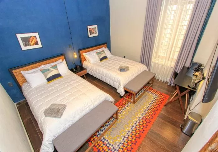 Bed in Antigua Trece Hotel Fusión & SPA