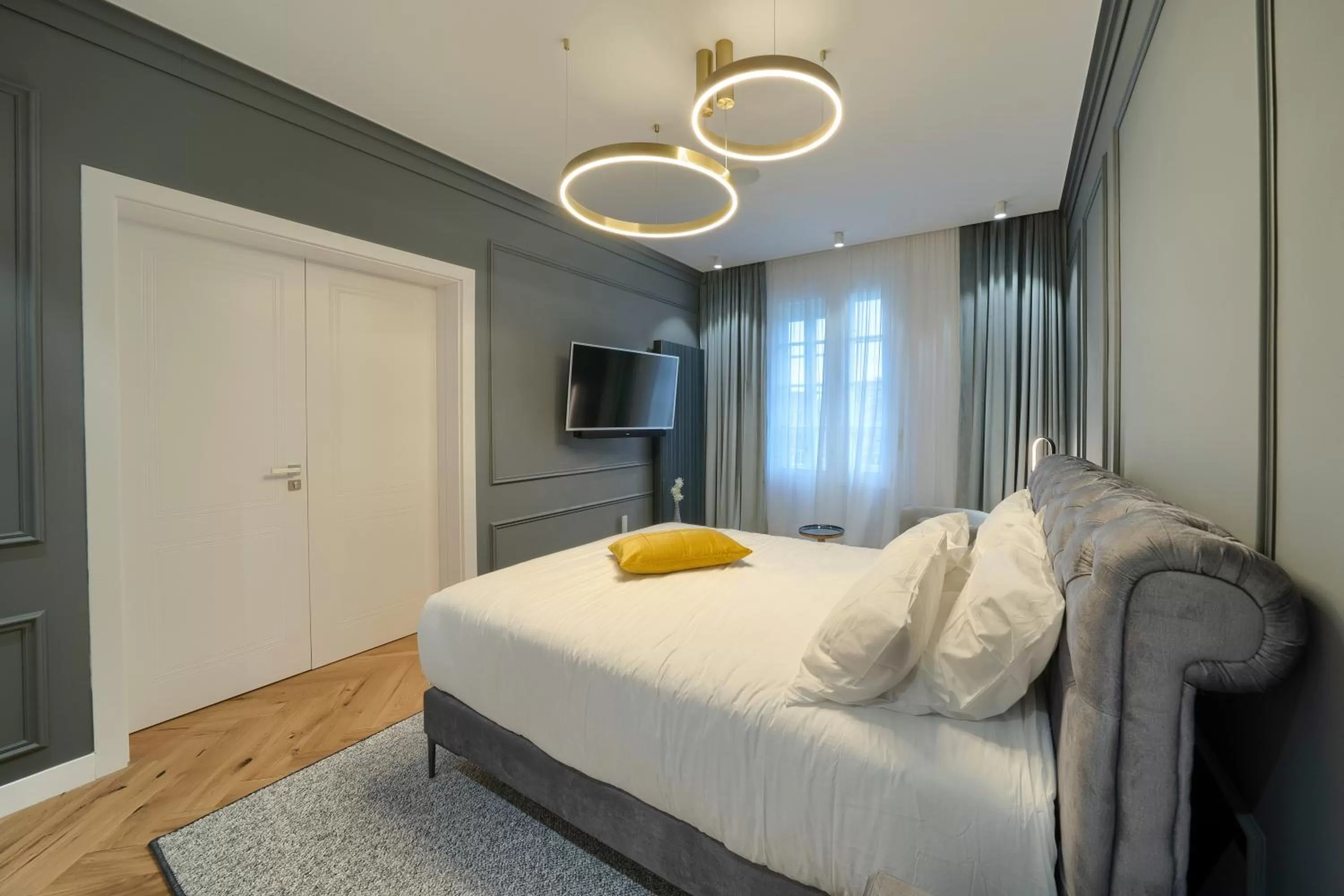 Photo of the whole room, Bed in Elysium Residence