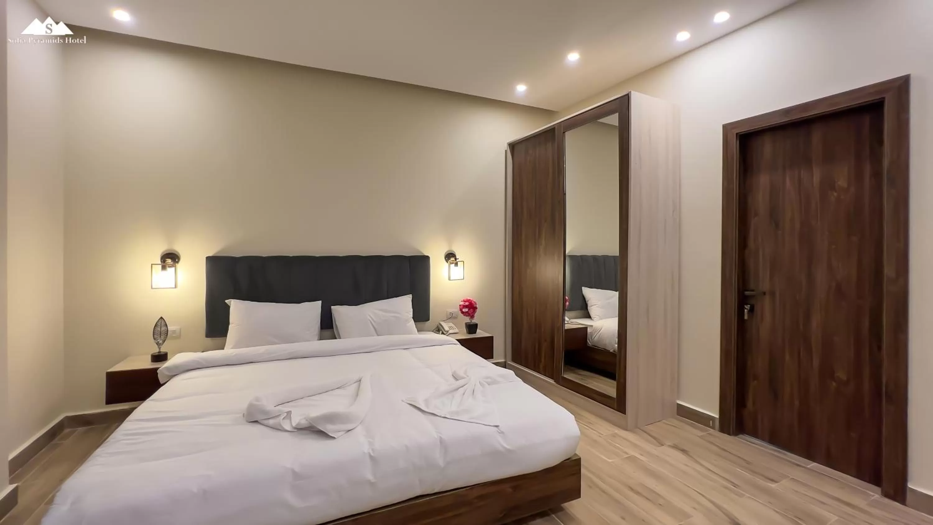 Bed in Sofia Pyramids Hotel