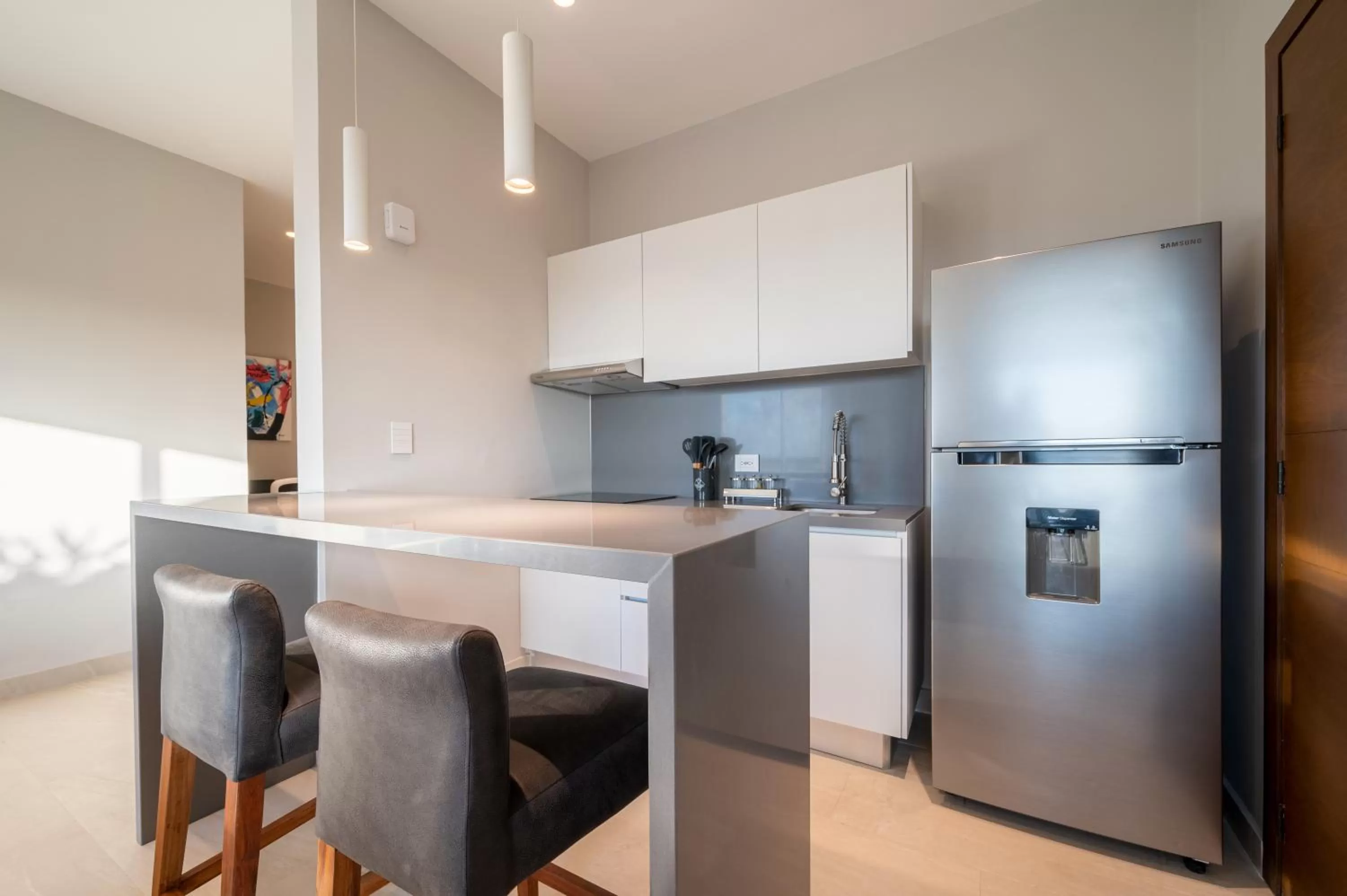 Kitchen or kitchenette in Kippal - Modern Oasis - ApartHotel