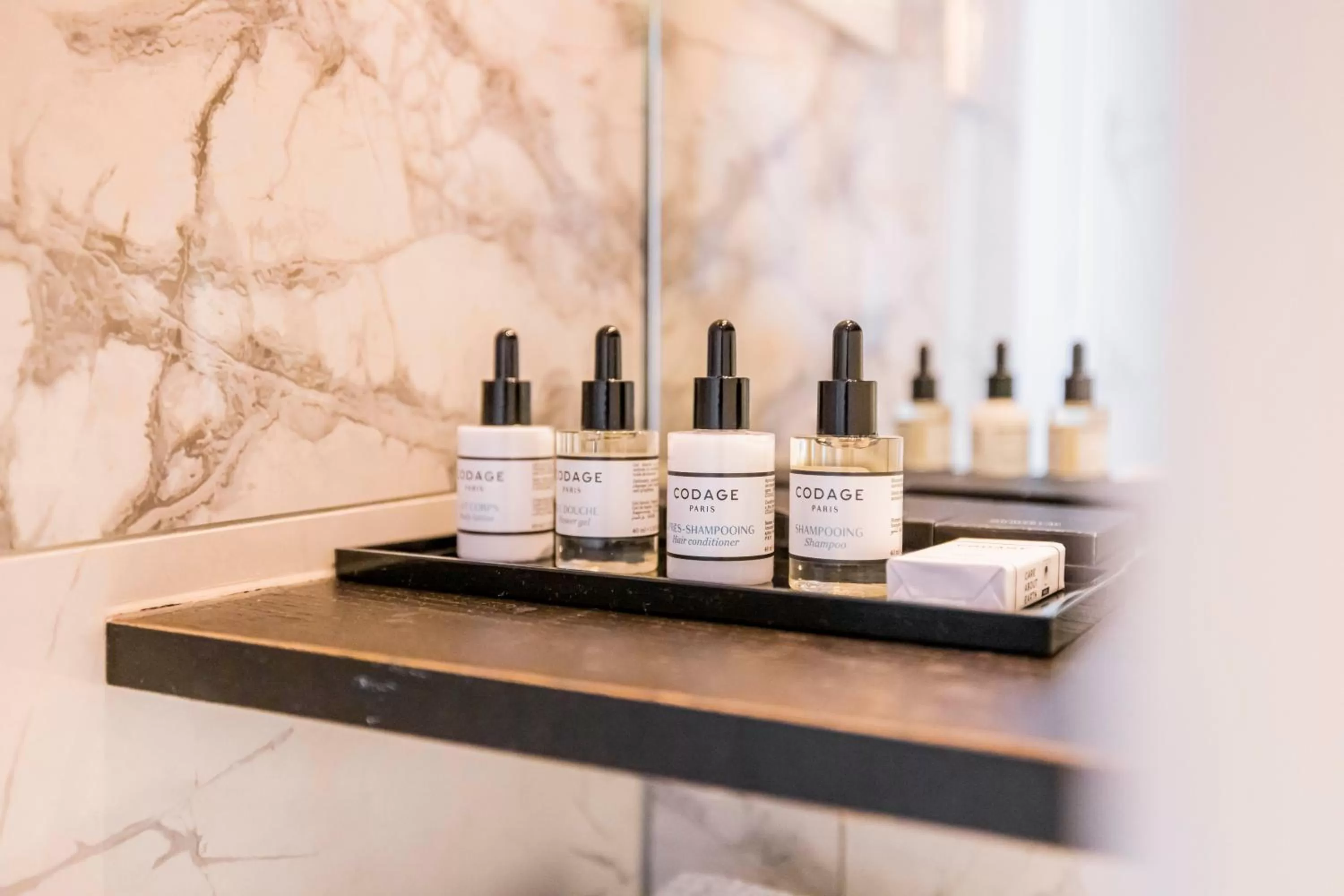 Bathroom in Boutique Hotel Sablon by CW Hotel Collection