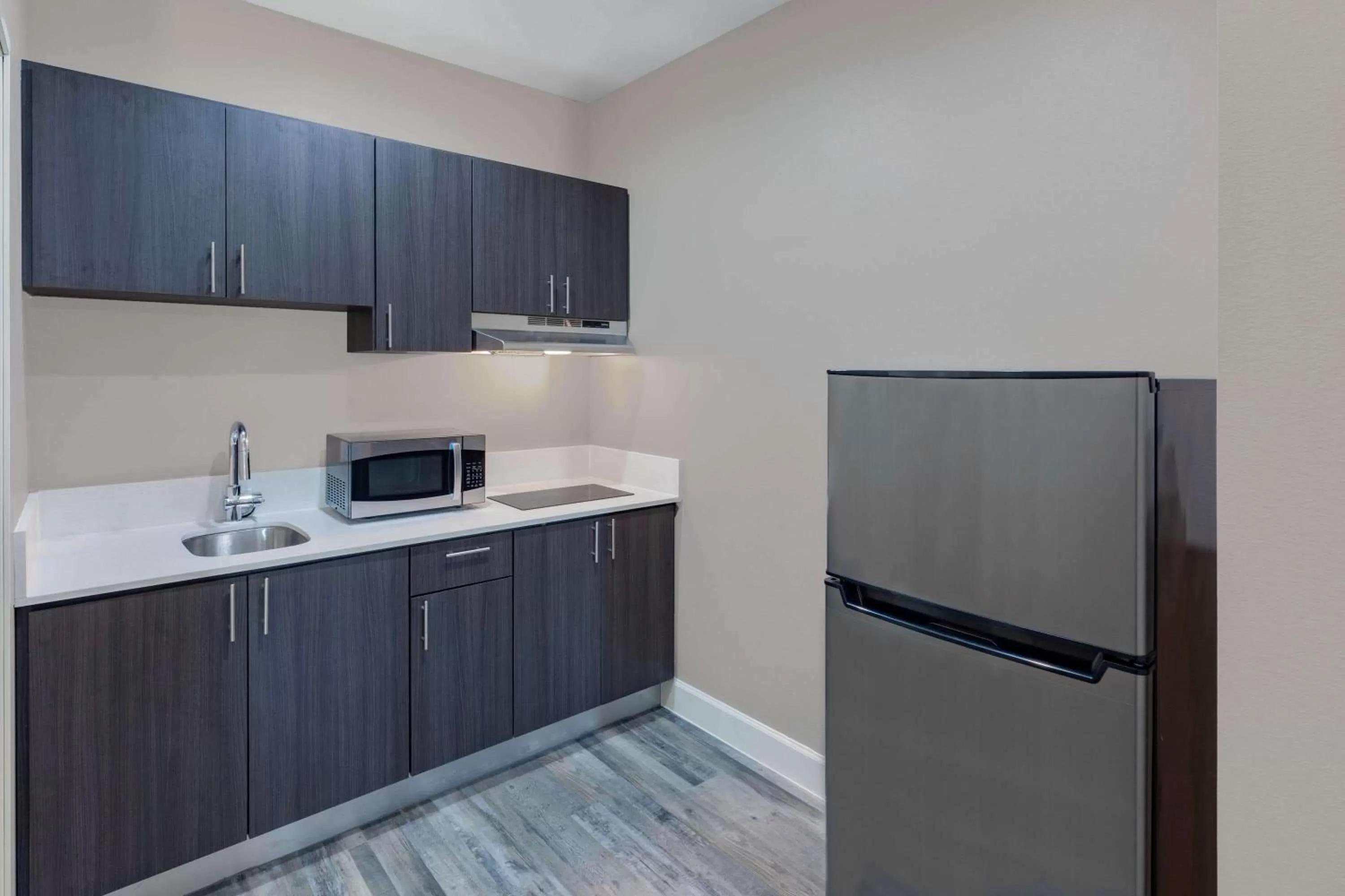 Kitchen or kitchenette in Super 8 by Wyndham Houston NW Beltway 8-West Rd